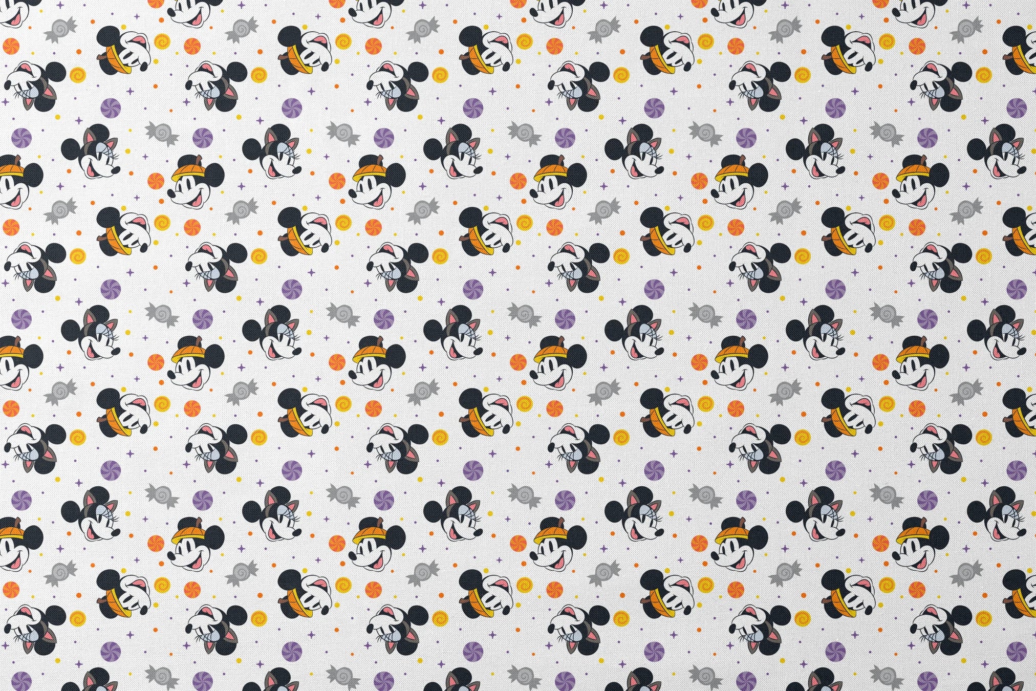 Mickey and Minnie Mouse cartoon heads scattered with wrapped candies and colorful dots on white background designs flat mockup