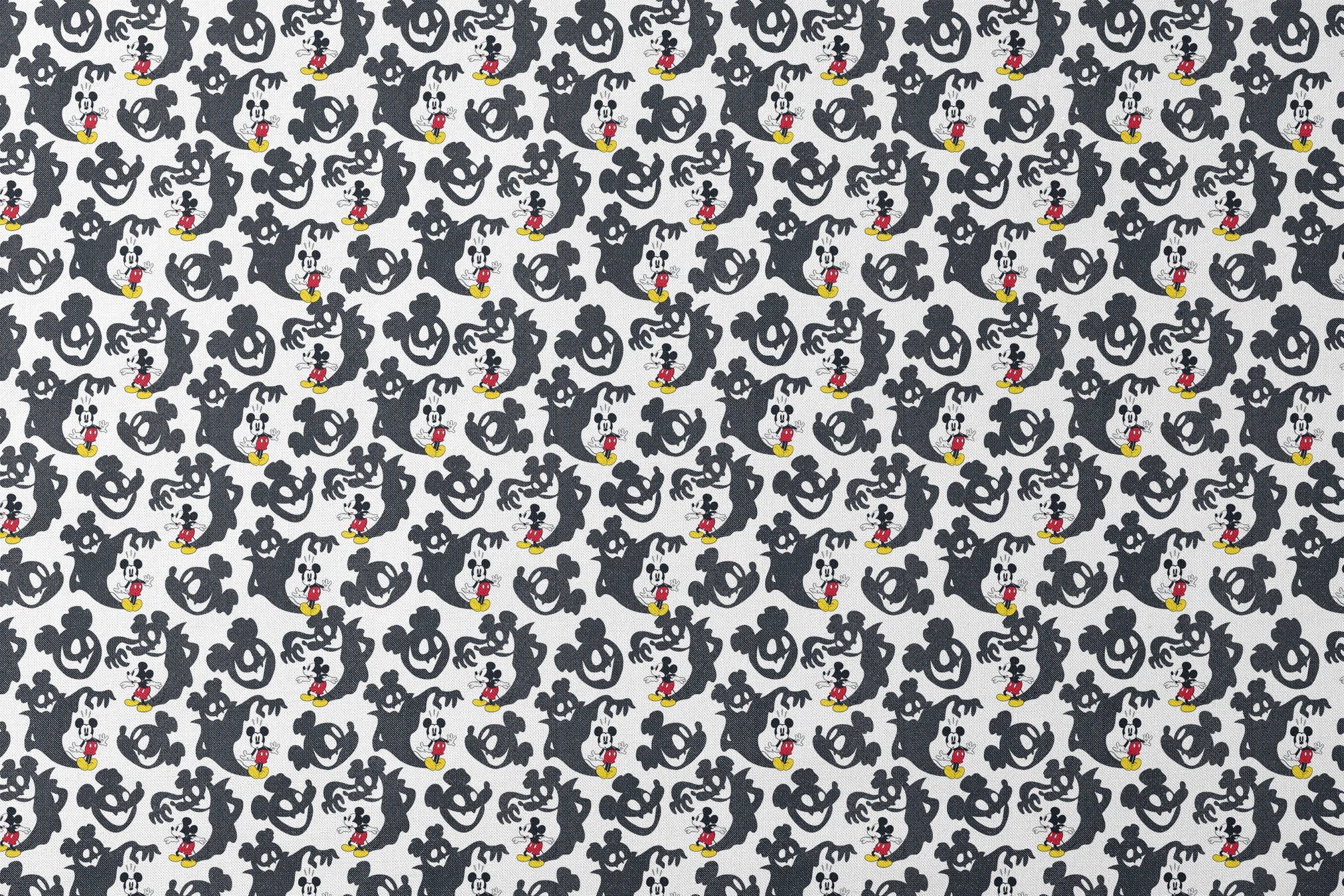 Mickey Mouse pattern with black ghost silhouettes on white background designs flat mockup