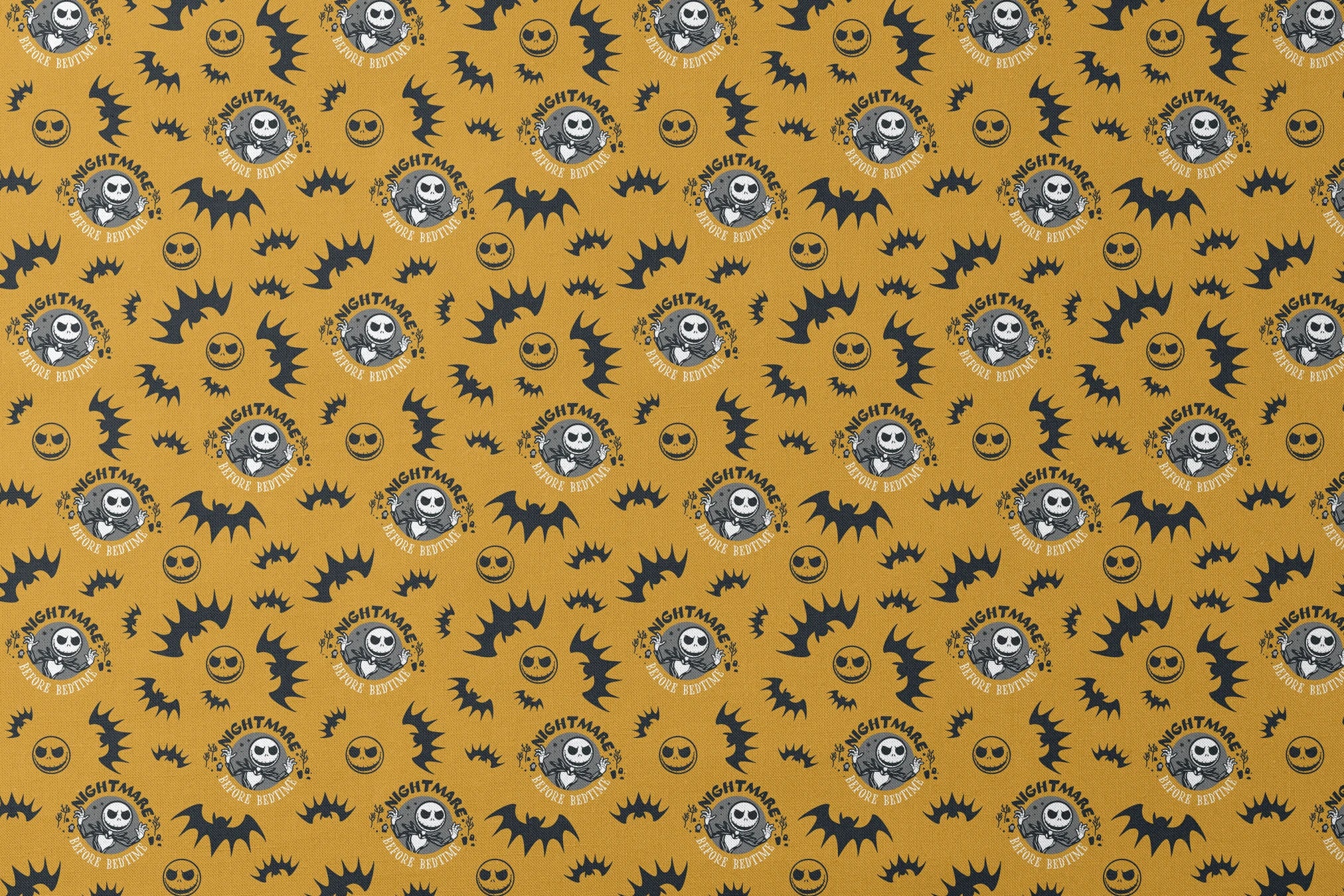 Halloween pattern with skeletal figure, "Nightmare" text, yellow background, black bats and smiling faces designs flat mockup
