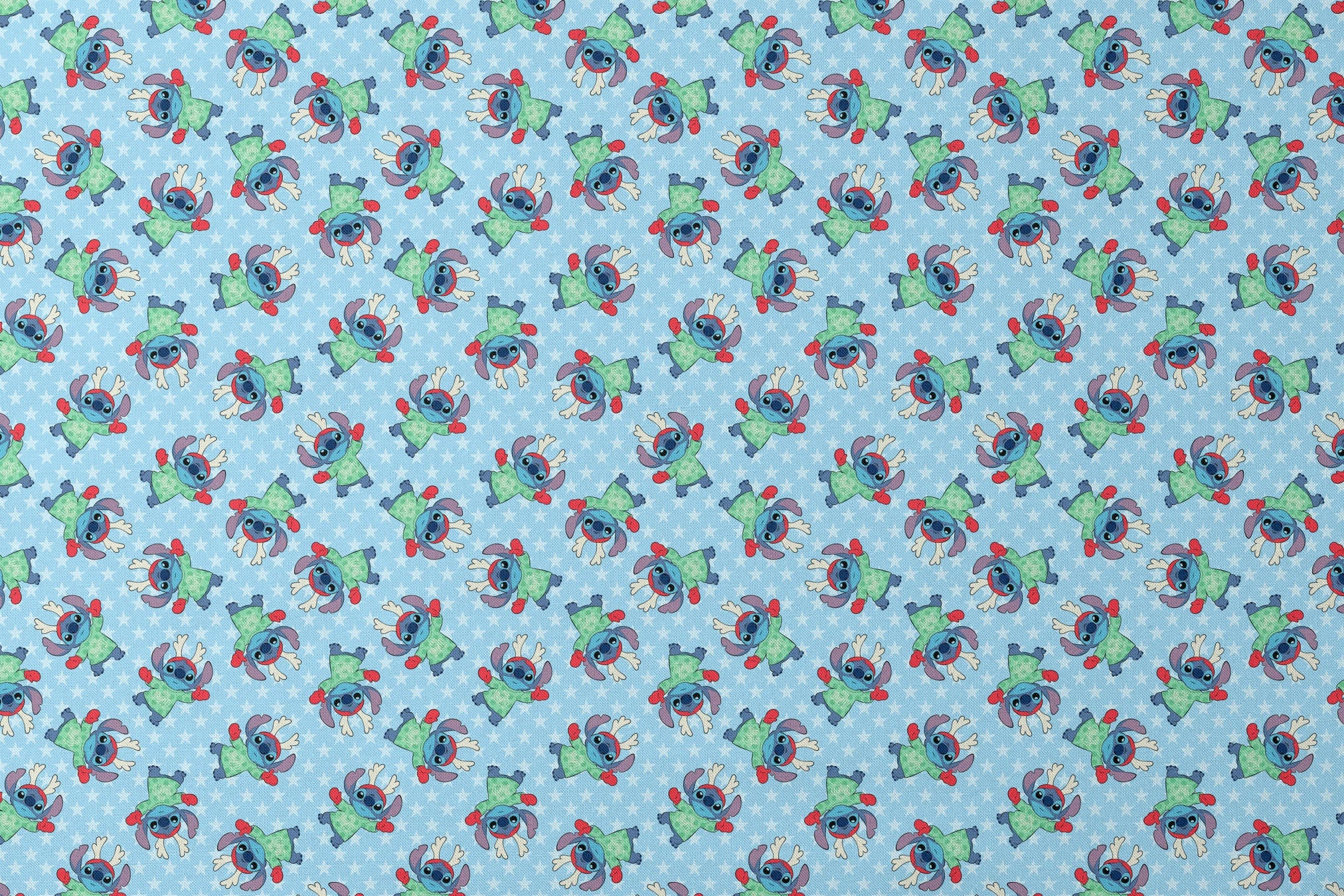 A repeating pattern of Disney's Stitch in holiday outfits with Christmas trees on light blue snowflake background. designs flat mockup
