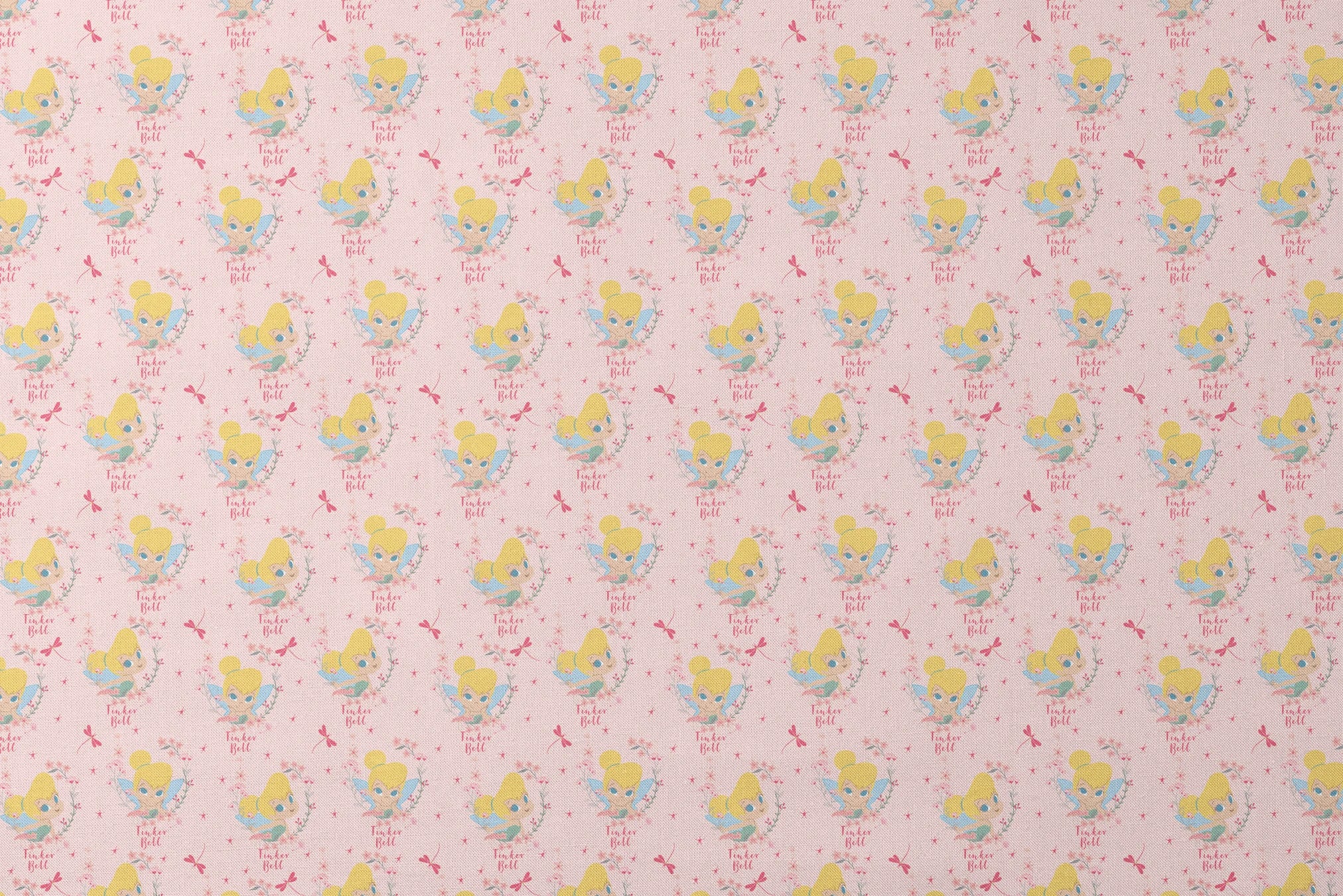 Pink background with Tinker Bell surrounded by flowers, stars, and dragonflies designs flat mockup