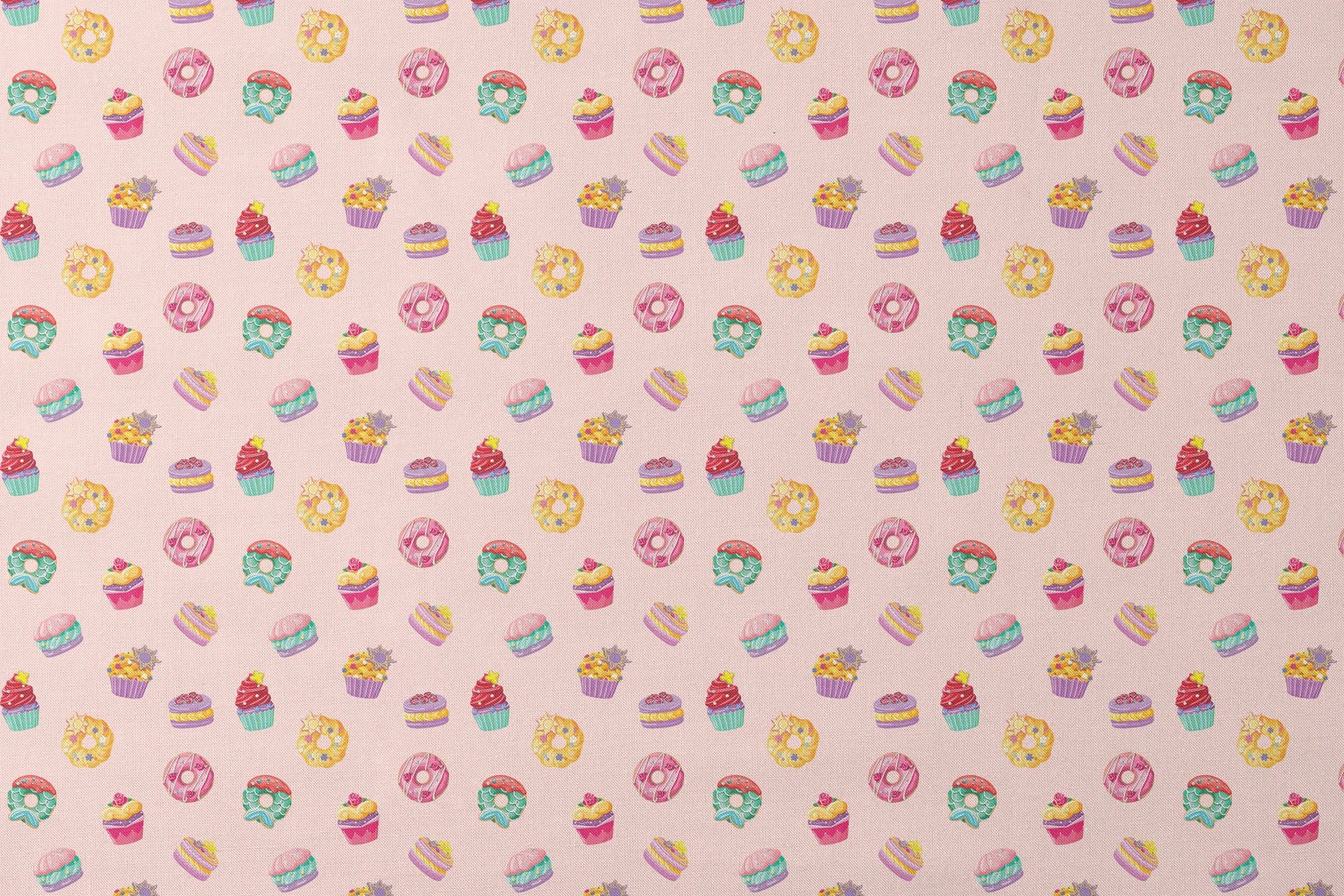DIsney Princess-inspired dessert pattern with donuts, cupcakes, and macarons on a light pink background designs flat mockup
