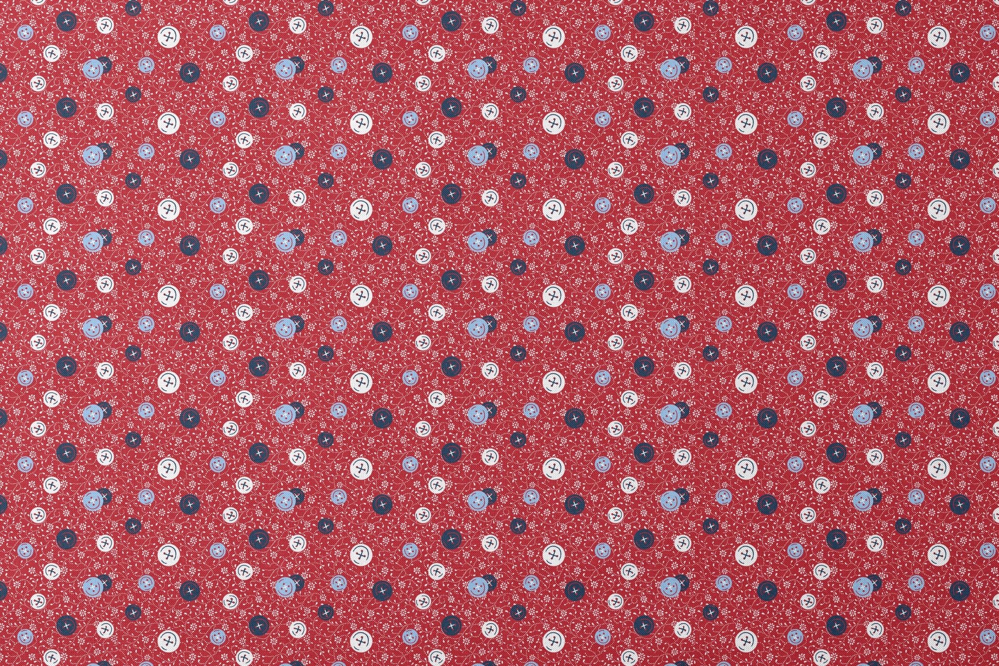 Red background with small white floral pattern featuring scattered button designs in blue, white, and navy cross details designs flat mockup