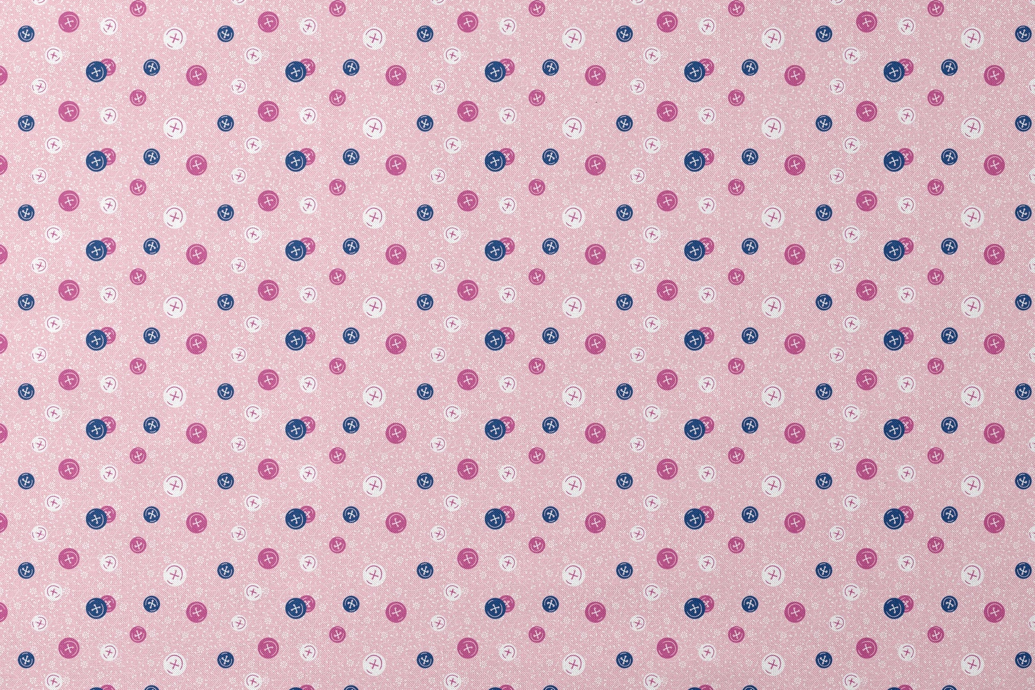 Scattered buttons in white, pink, and navy on a light pink floral background designs flat mockup
