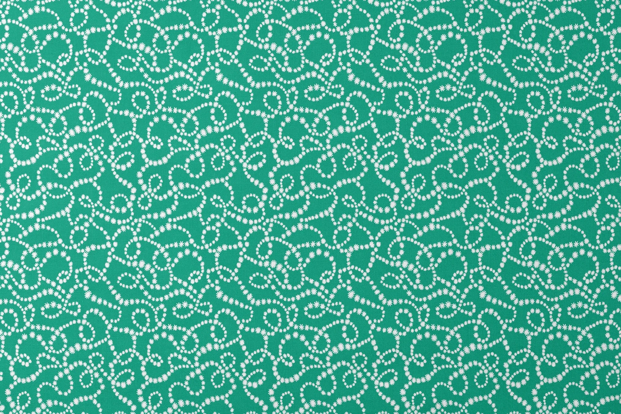 White dotted swirling patterns on green background forming abstract curving lines designs flat mockup