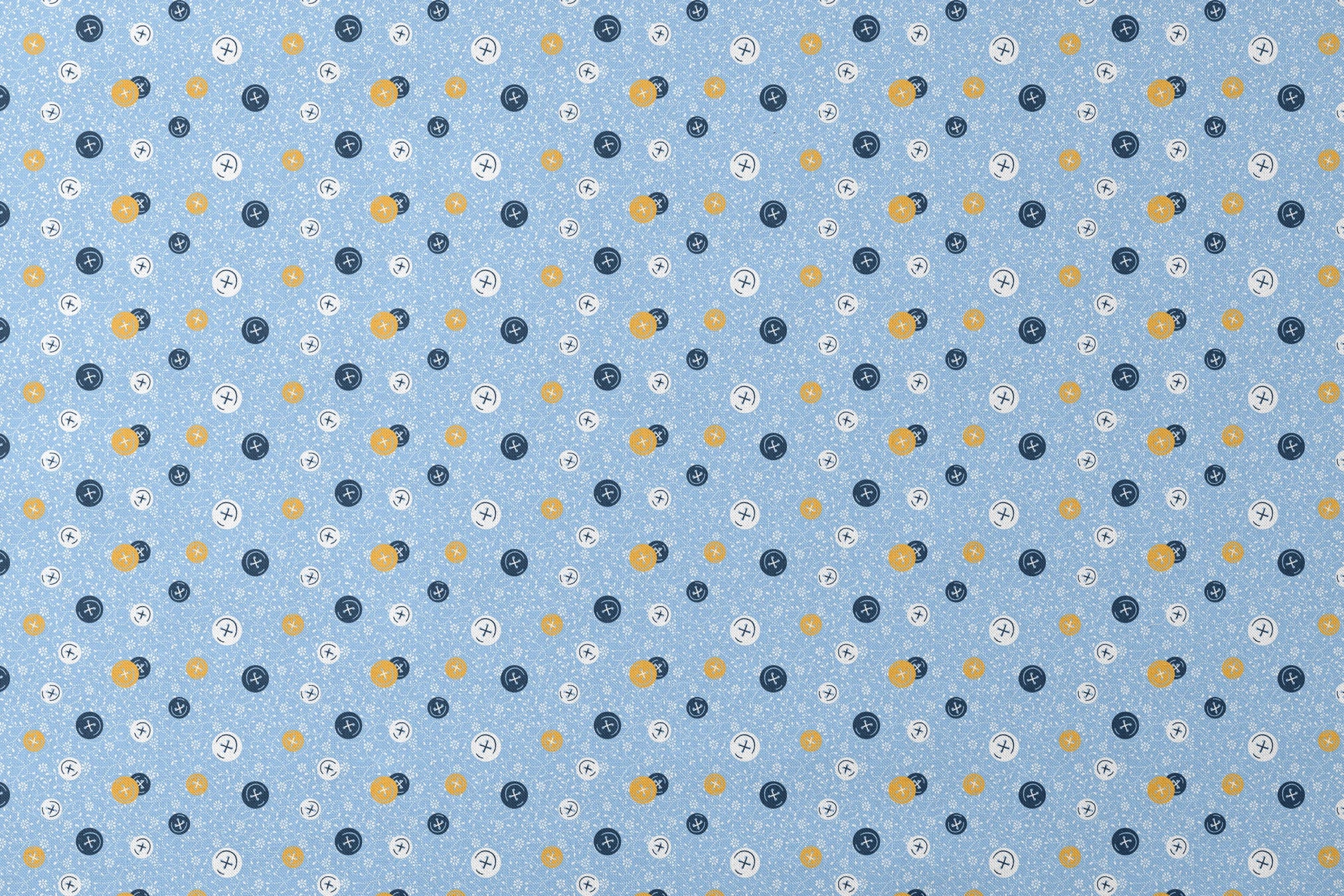 Blue background with scattered circular buttons in white, navy, and gold, each featuring cross designs, on a floral pattern. designs flat mockup