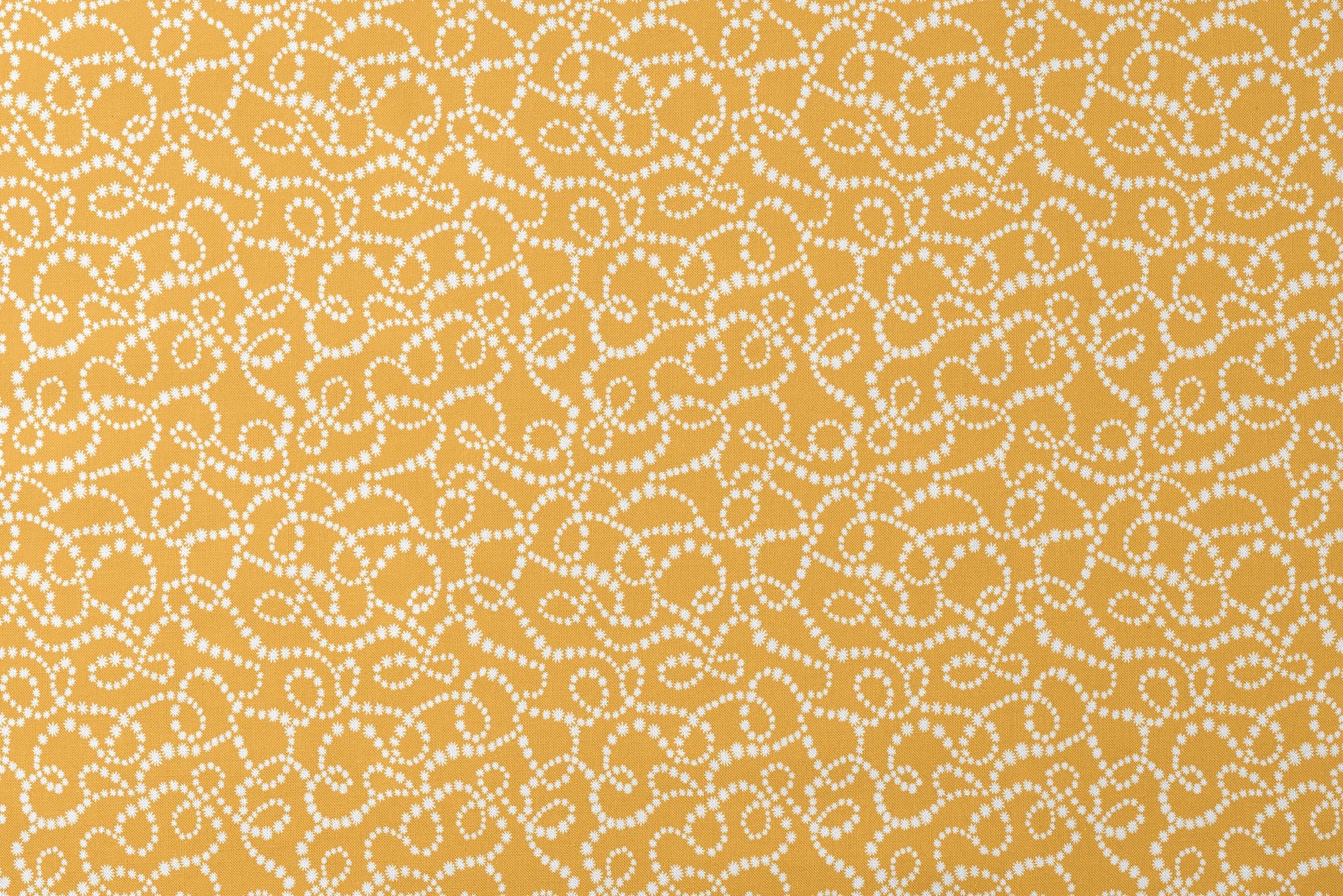 Mustard yellow background with swirling dotted white patterns forming organic circular designs designs flat mockup