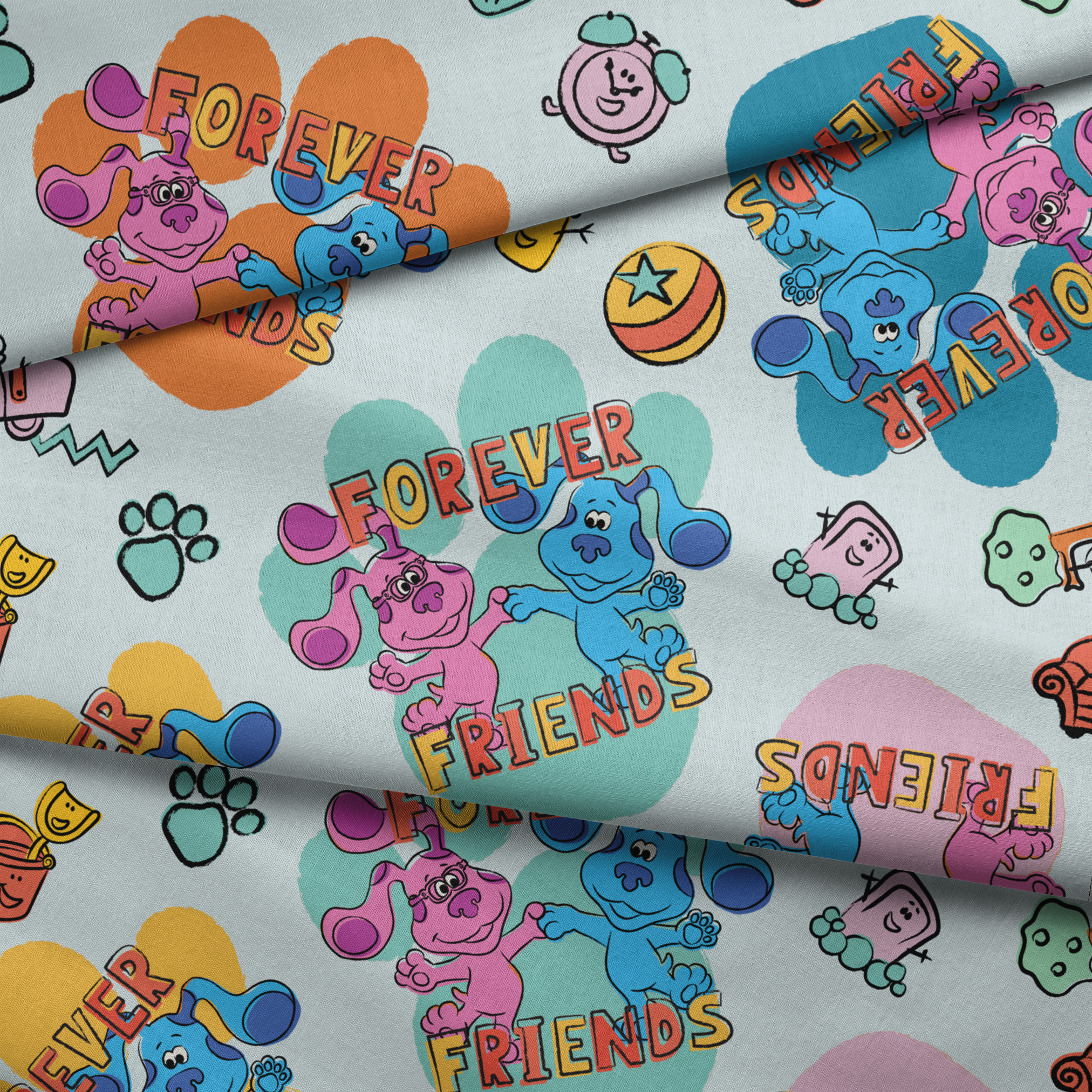 Colorful cartoon pattern with blue and pink characters, "FOREVER FRIENDS" text, and small playful icons on a light background fabric fold mockup