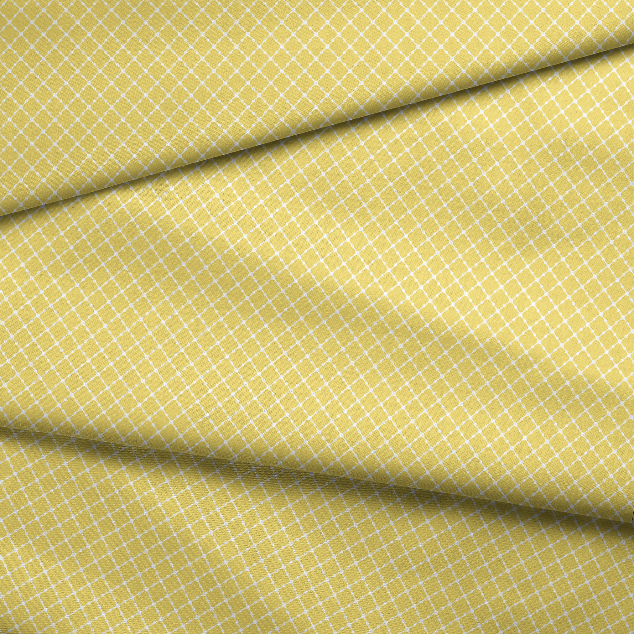 Yellow quatrefoil pattern on white background with Moroccan tile inspired design fabric fold mockup
