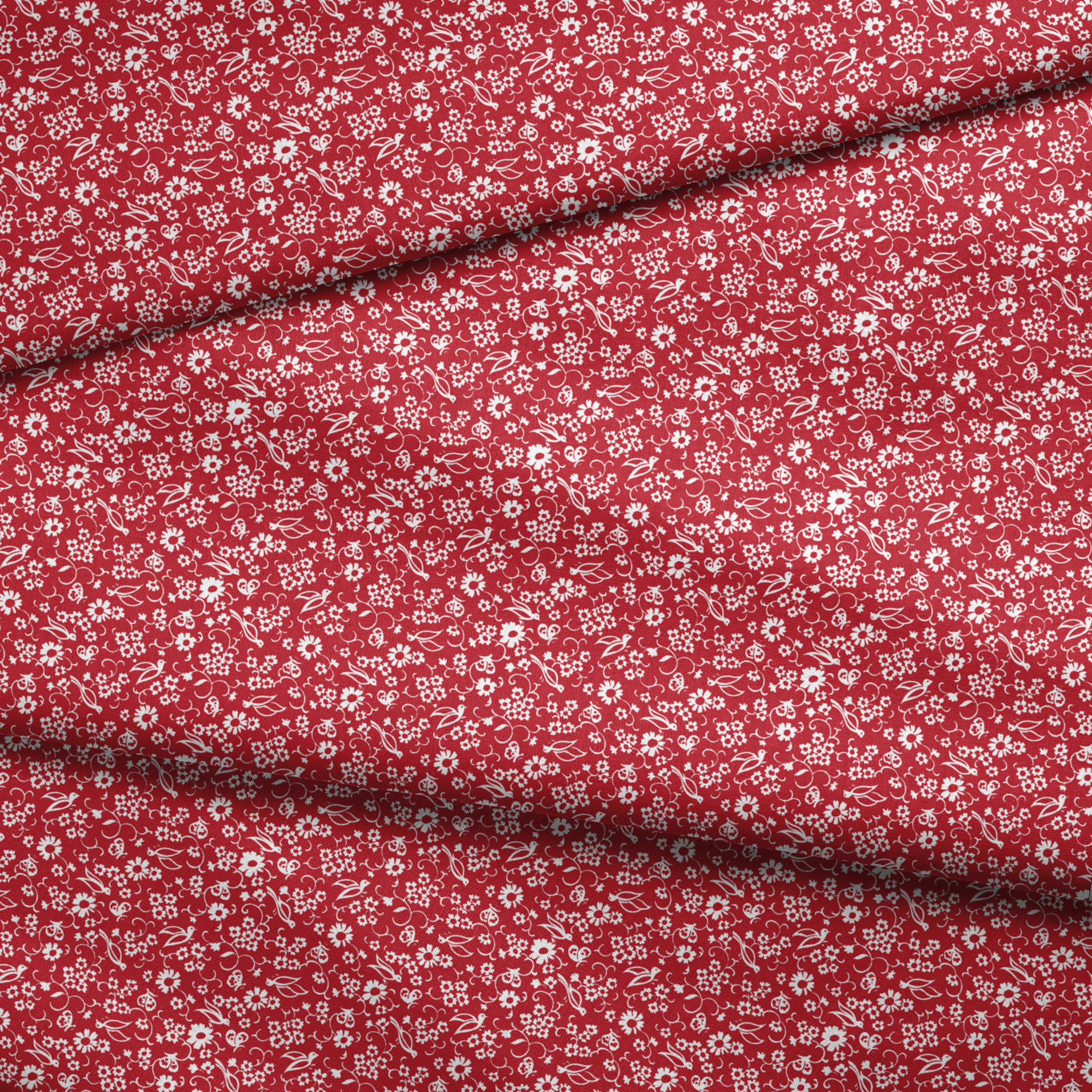 White floral and bird silhouette pattern on a bright red background. fabric fold mockup