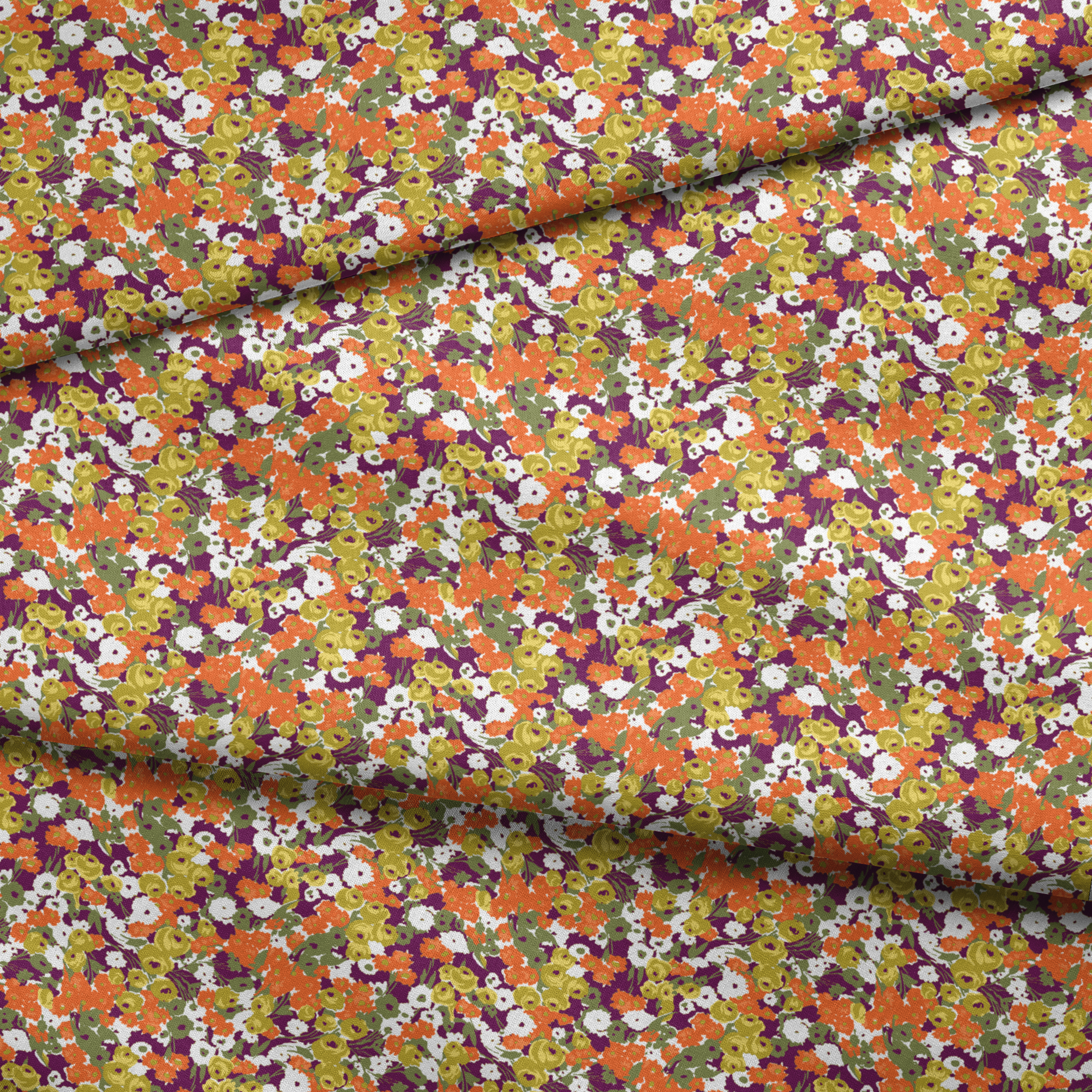 Vibrant floral pattern with white, orange, yellow, green, and purple abstract blooms fabric fold mockup