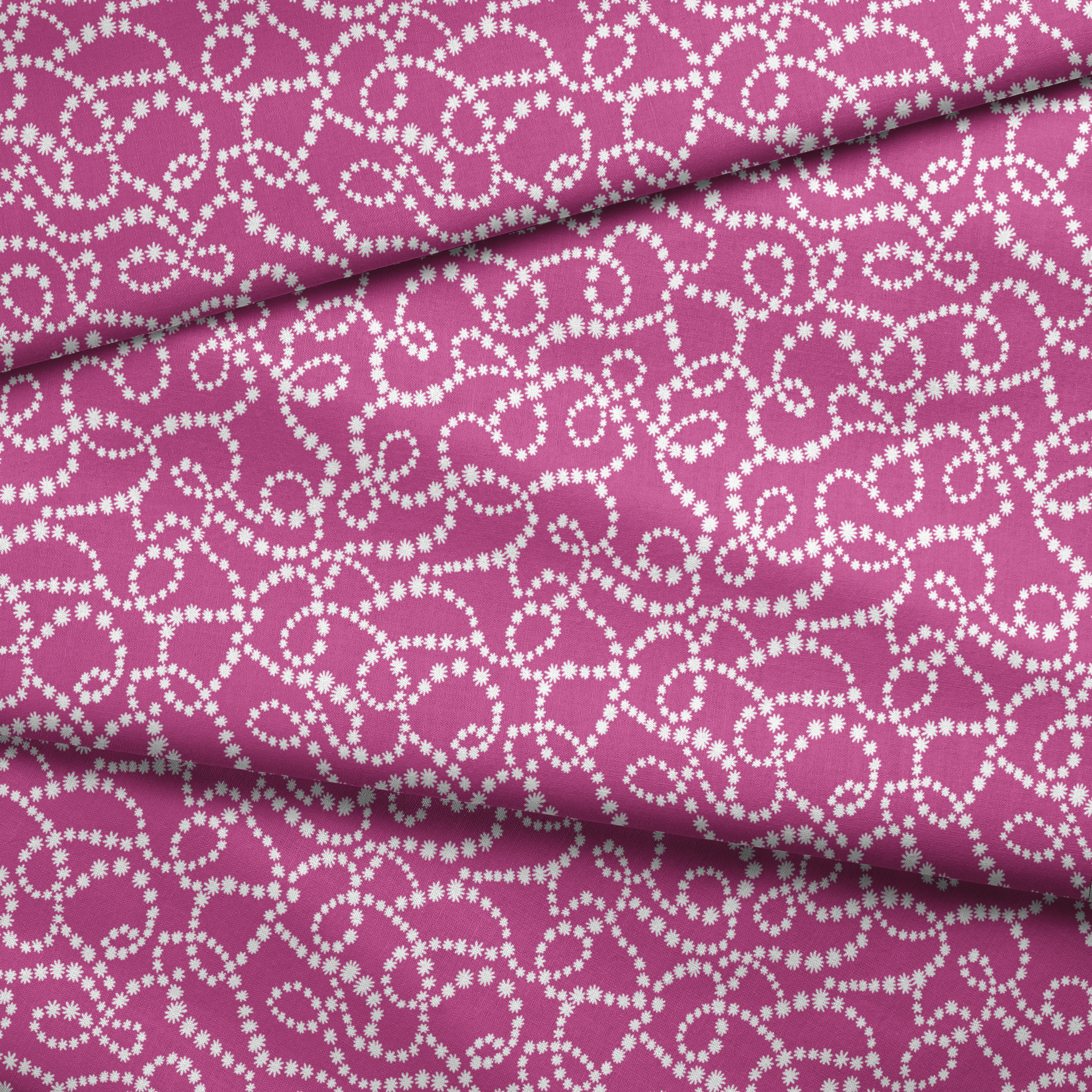 Magenta background with swirling white dotted pattern resembling pearl strands in decorative loops fabric fold mockup