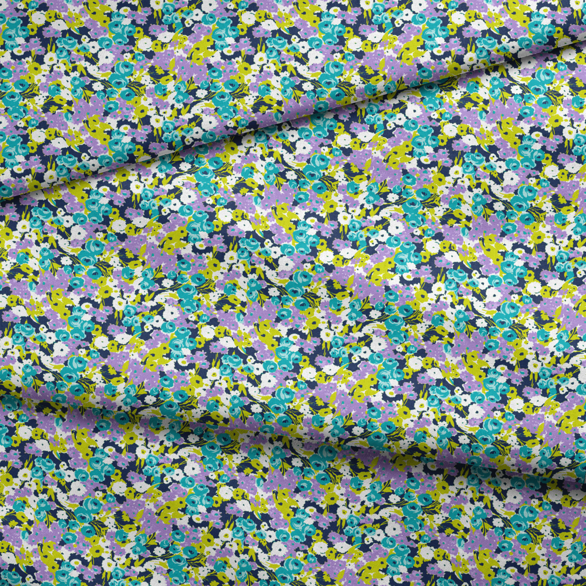 Vibrant floral pattern with turquoise, purple, white, and chartreuse blooms on dark background fabric fold mockup
