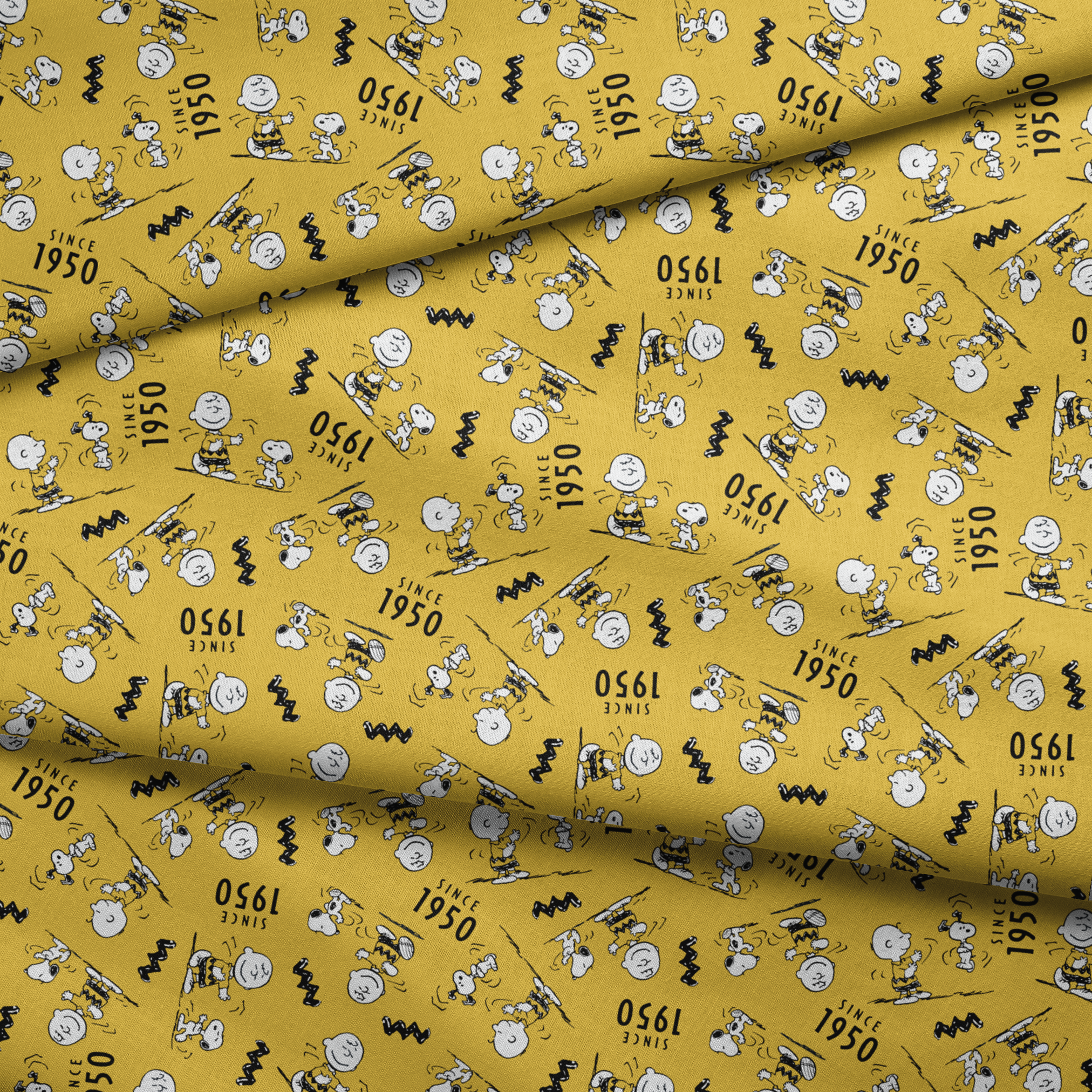 Peanuts cartoon pattern on yellow background with Snoopy and Charlie Brown, "Since 1950" text fabric fold mockup