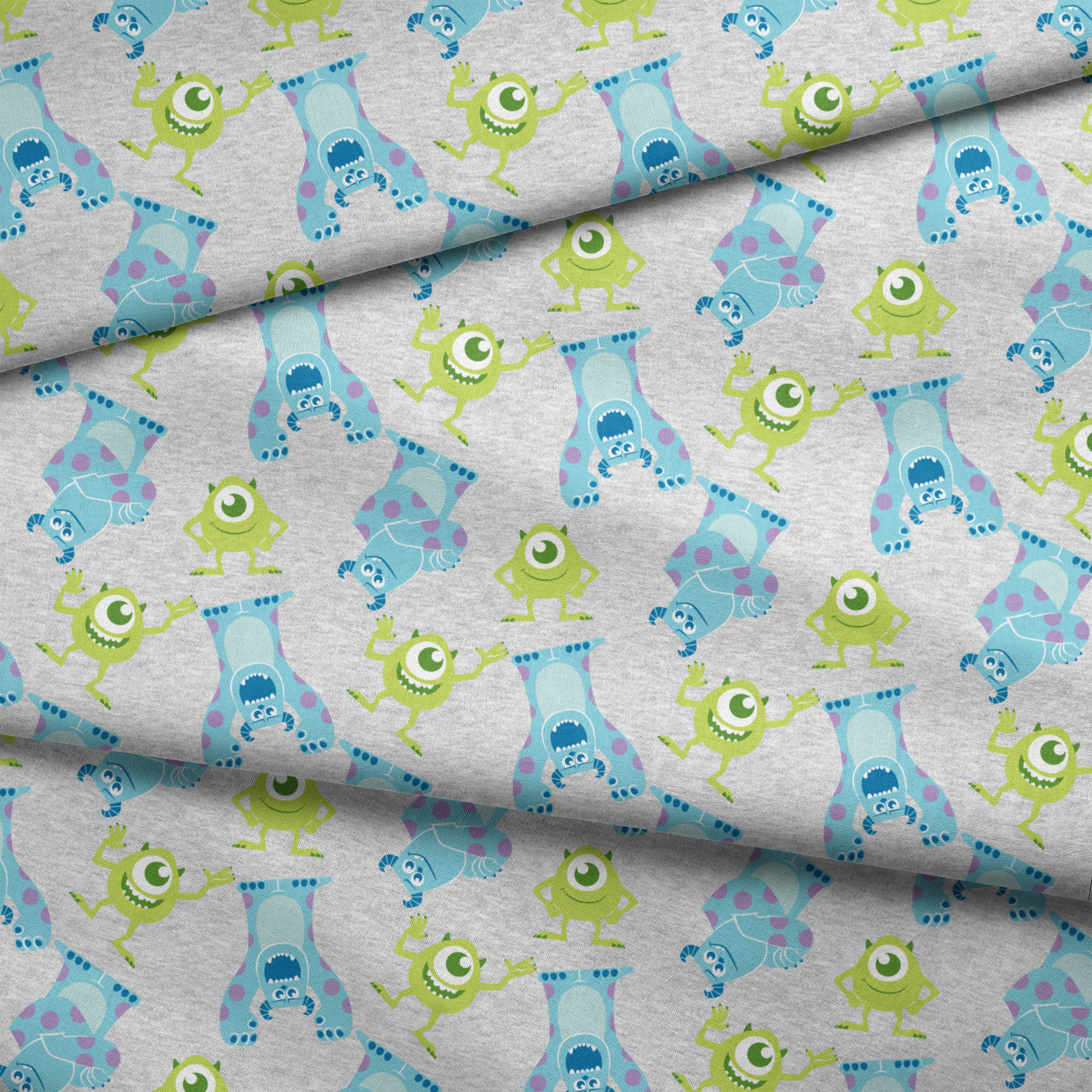 Cartoon pattern of Monsters Inc characters on light gray background fabric fold mockup