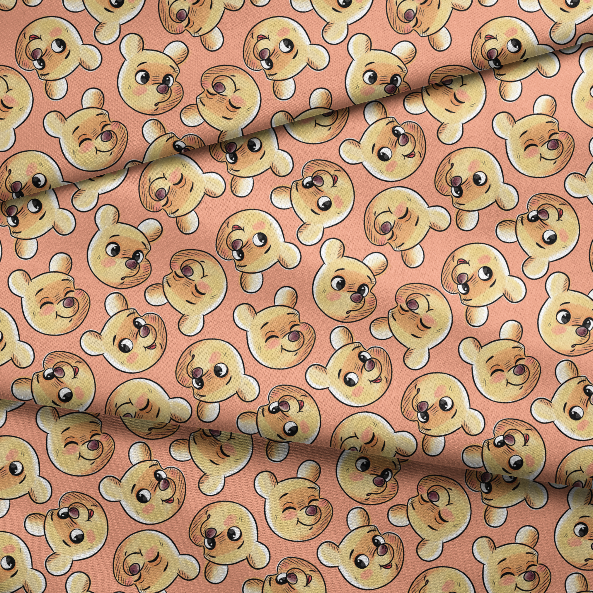 Cartoon teddy bear faces with cute expressions on peach background in repeating pattern fabric fold mockup