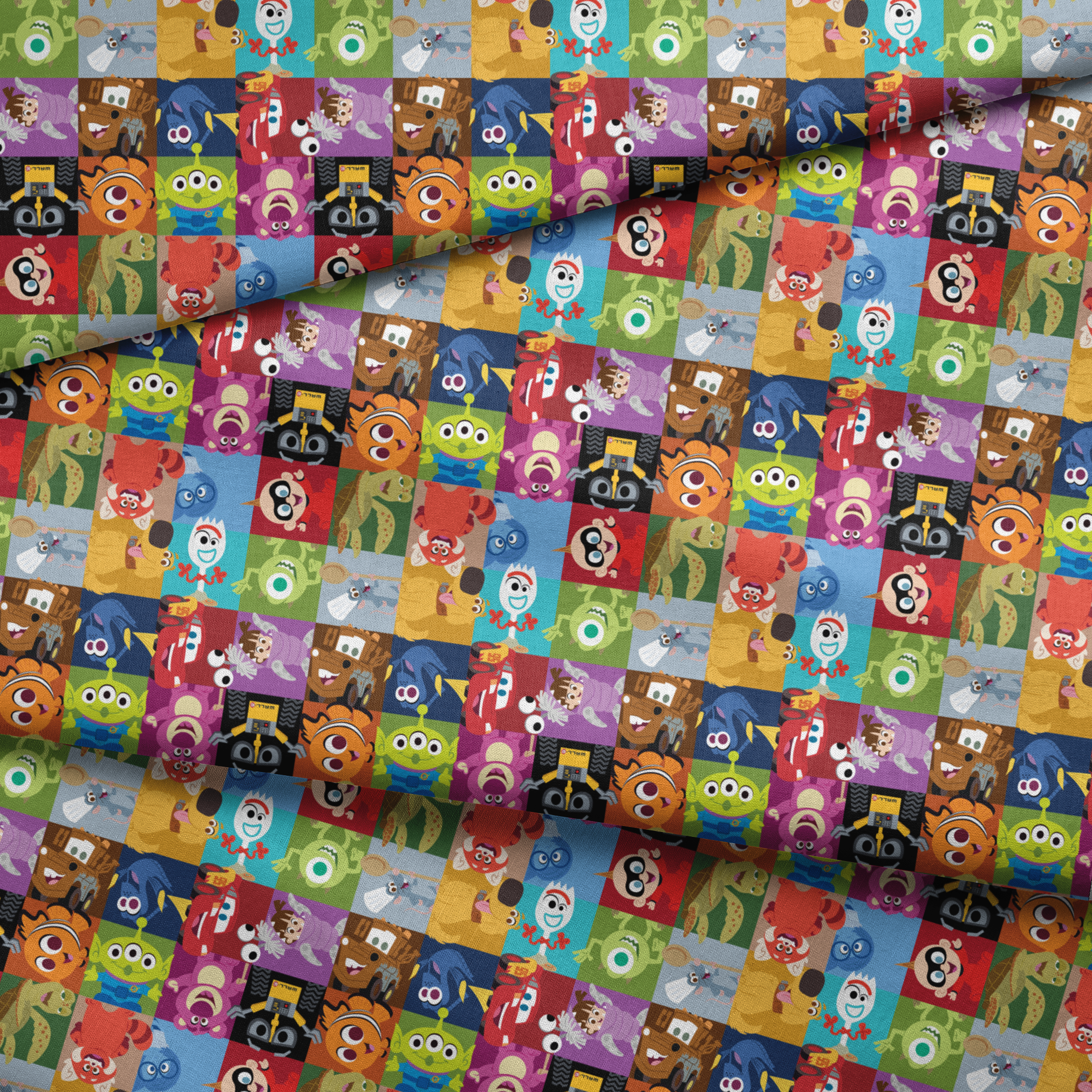 Grid of stylized Disney/Pixar characters including Mike Wazowski, Nemo, Wall-E, Lightning McQueen, Dory, and others in colorful squares fabric fold mockup