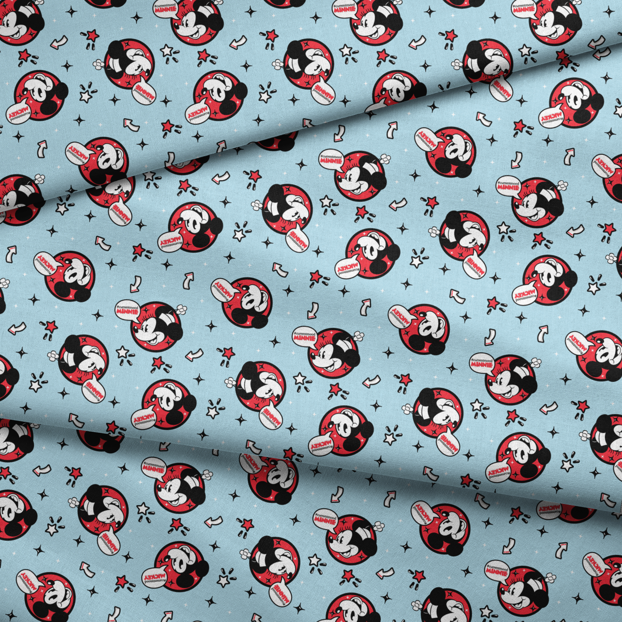 Disney Mickey Mouse pattern with red circular emblems on light blue background with stars and arrows fabric fold mockup