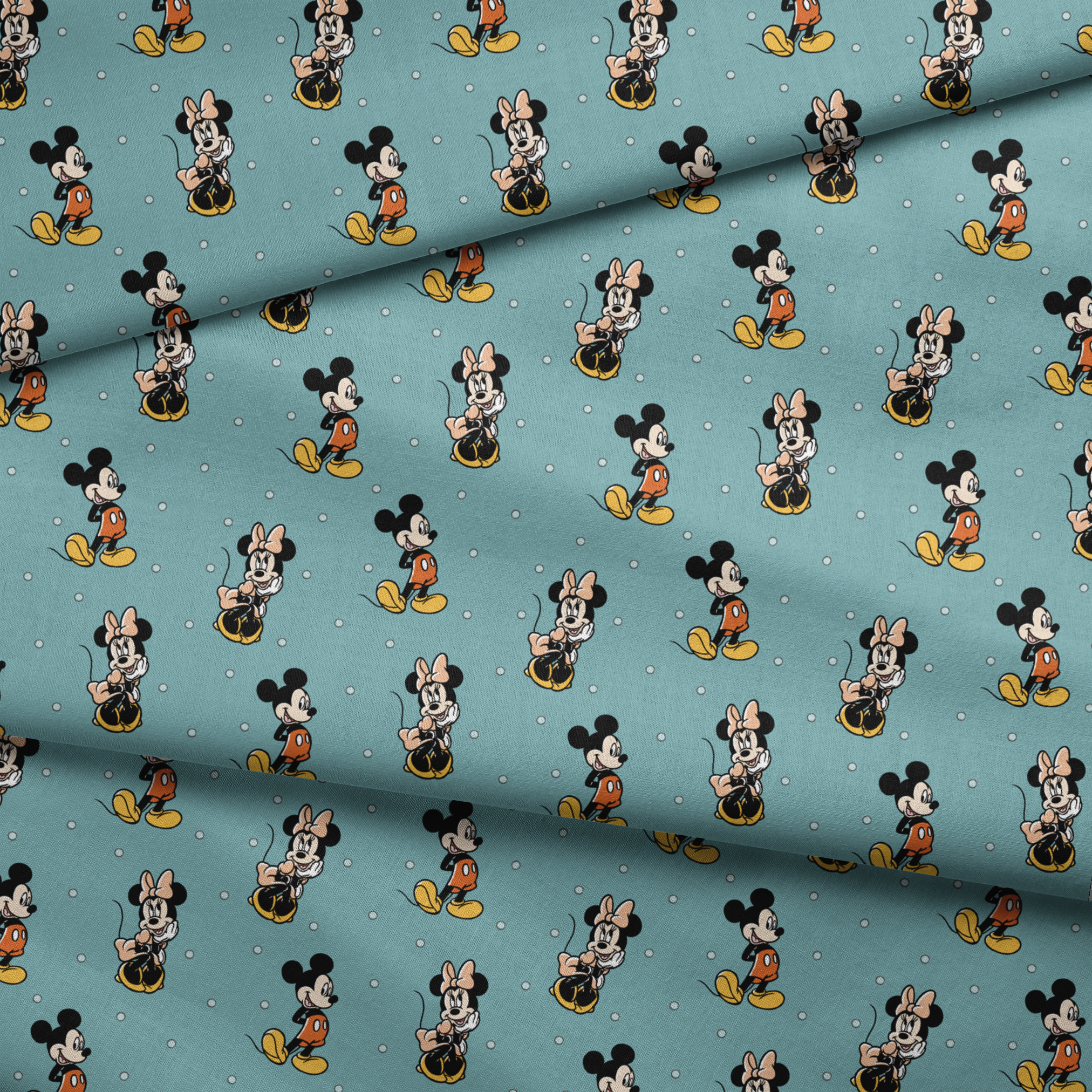 Cartoon pattern of Mickey and Minnie Mouse characters on light blue background with white dots fabric fold mockup