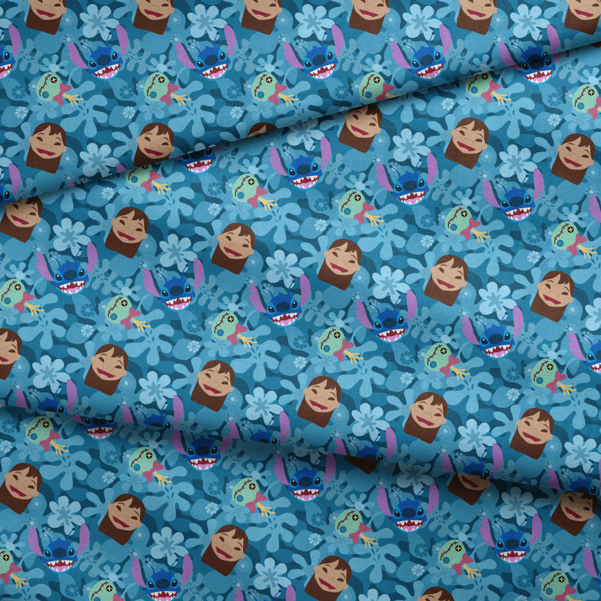 Disney's Stitch among floral elements and smiling faces on turquoise background fabric fold mockup