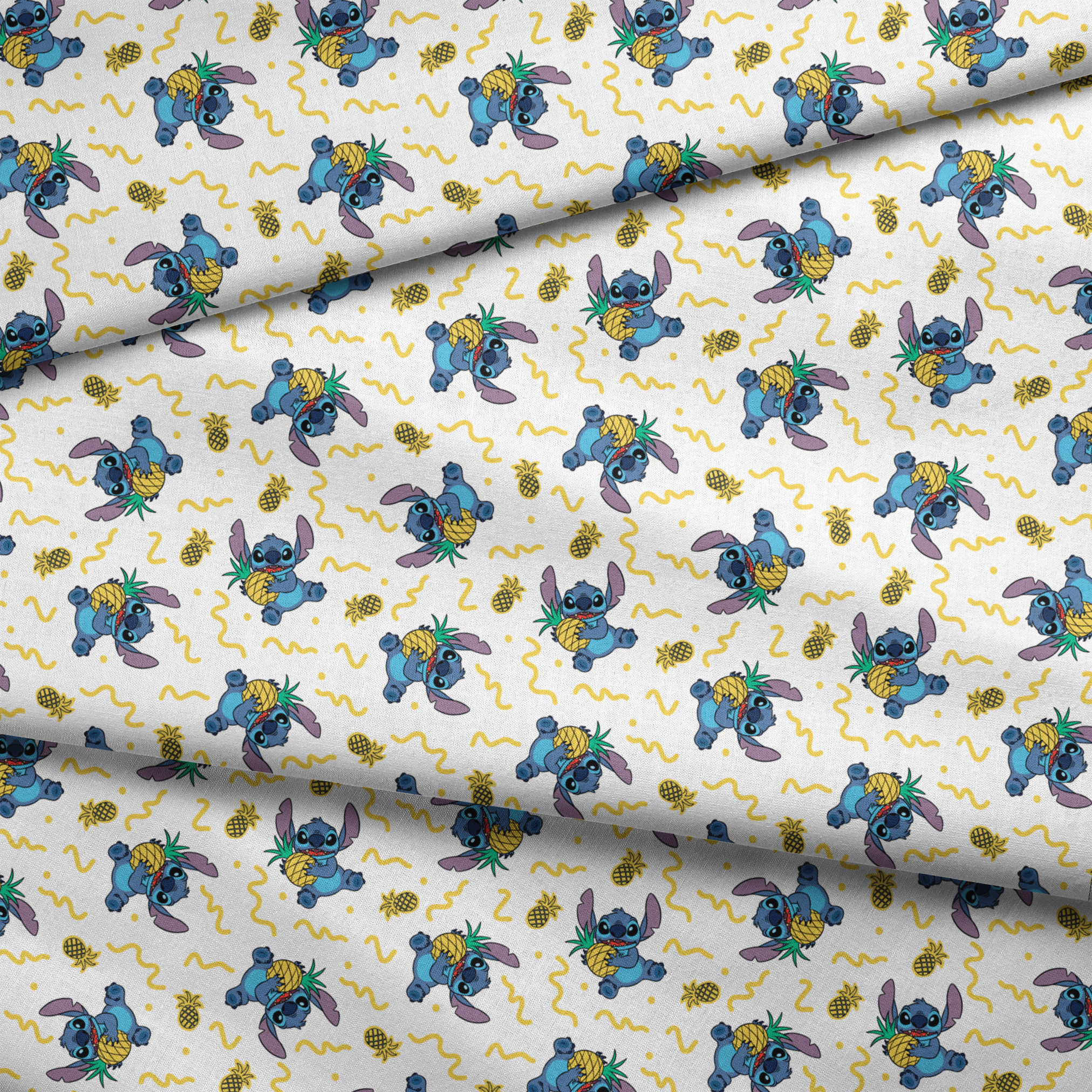 Disney's Stitch holding pineapples with yellow squiggly lines on white background pattern fabric fold mockup
