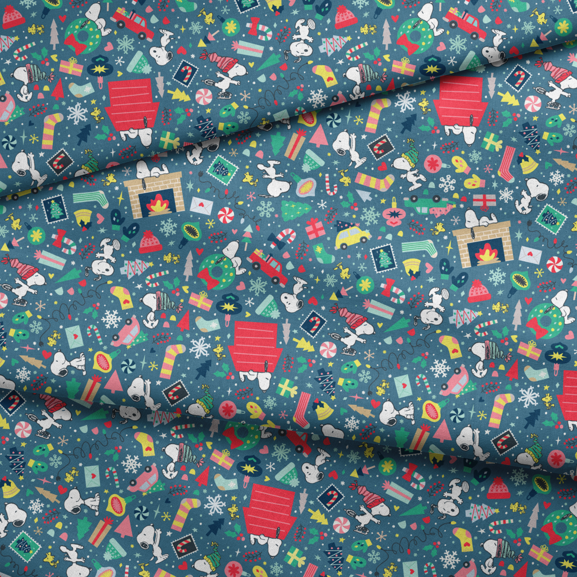 Colorful Peanuts Christmas pattern with festive icons, red mailboxes, presents, houses, and holiday symbols on teal background fabric fold mockup