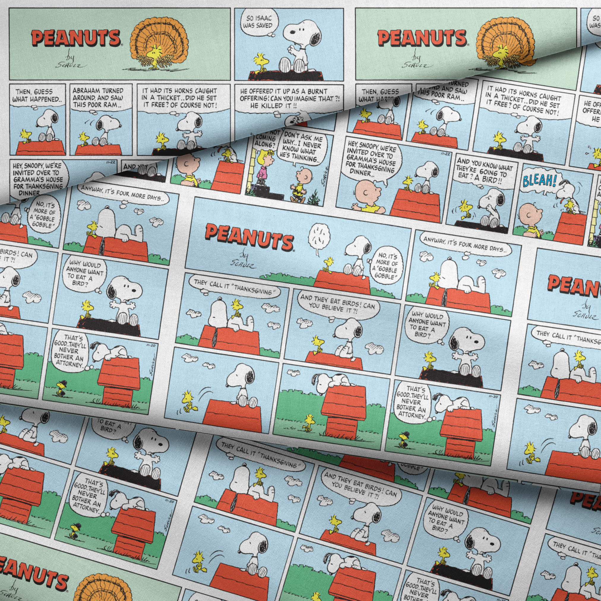 A Peanuts comic strip featuring Snoopy on his red doghouse, shown in multiple panels with Thanksgiving and food-related humor throughout the colorful Sunday format. fabric fold mockup