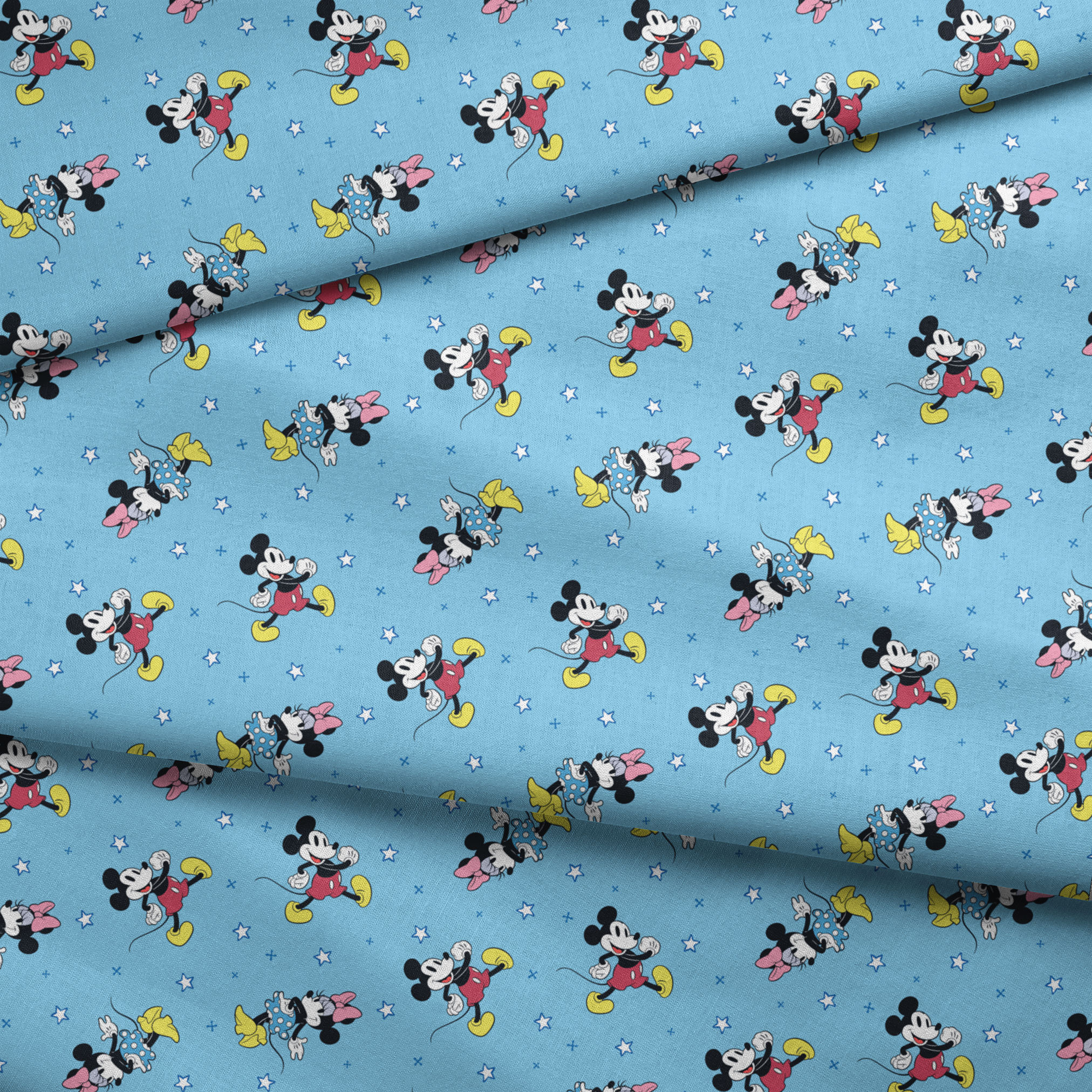 Disney Mickey Mouse and Minnie Mouse characters on light blue background with white stars, pattern design fabric fold mockup
