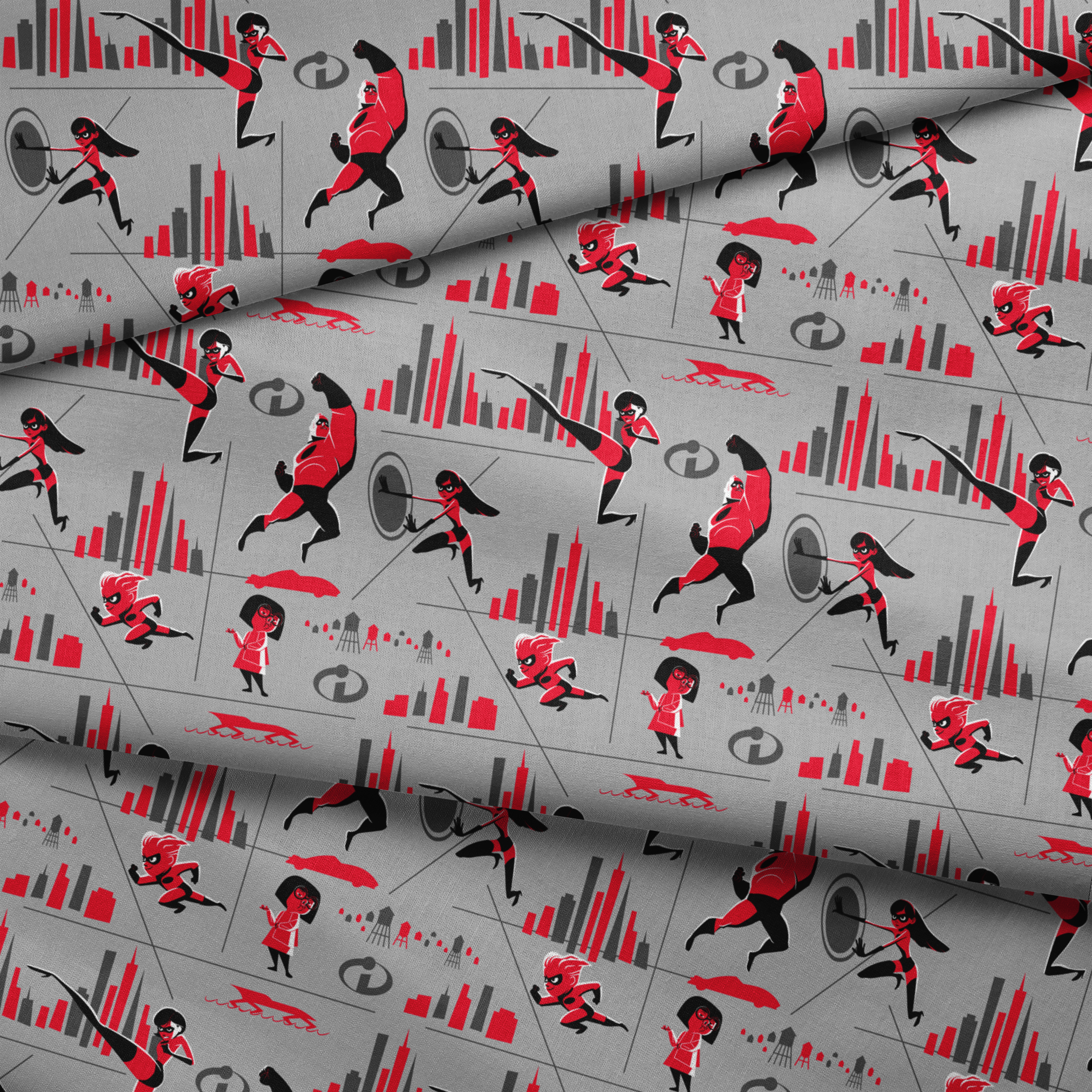 Characters in red and black superhero outfits from The Incredibles shown in action poses against gray background with city elements fabric fold mockup