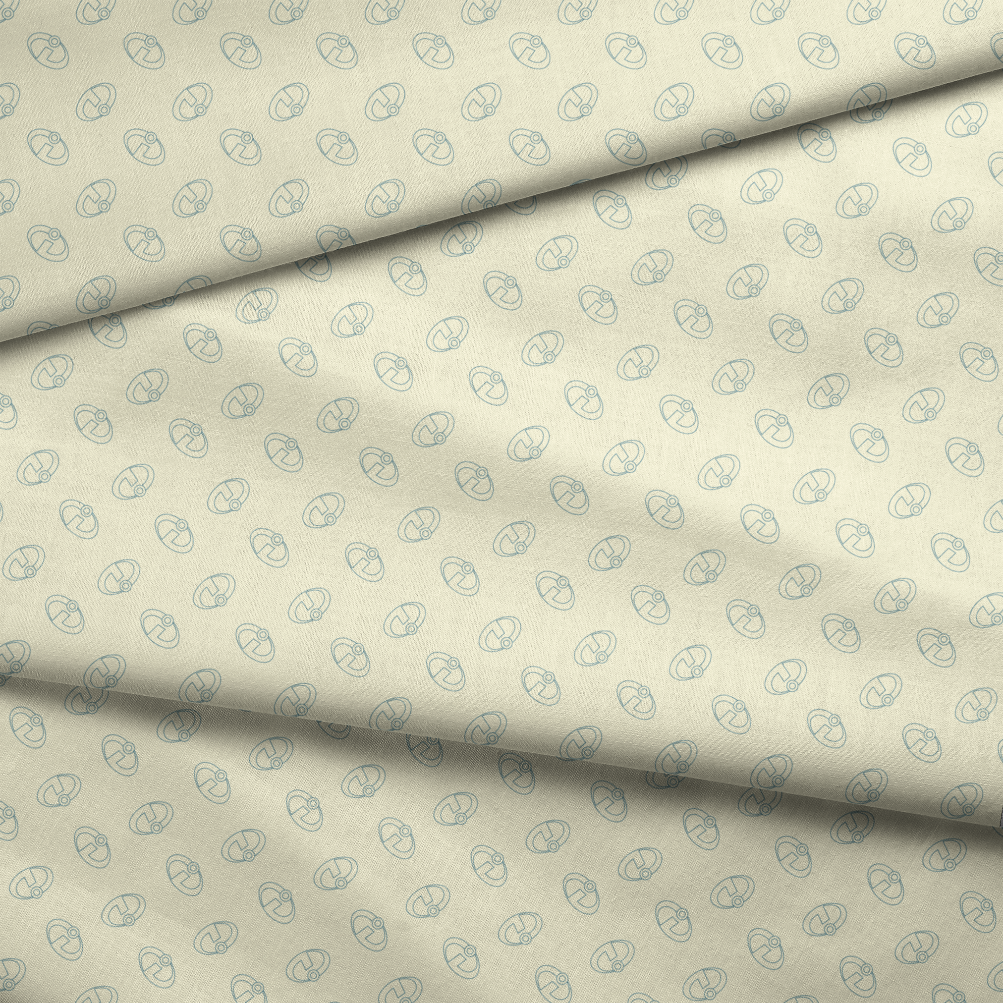 The Incredibles logo forming a repeating pattern on a pale yellow background fabric fold mockup