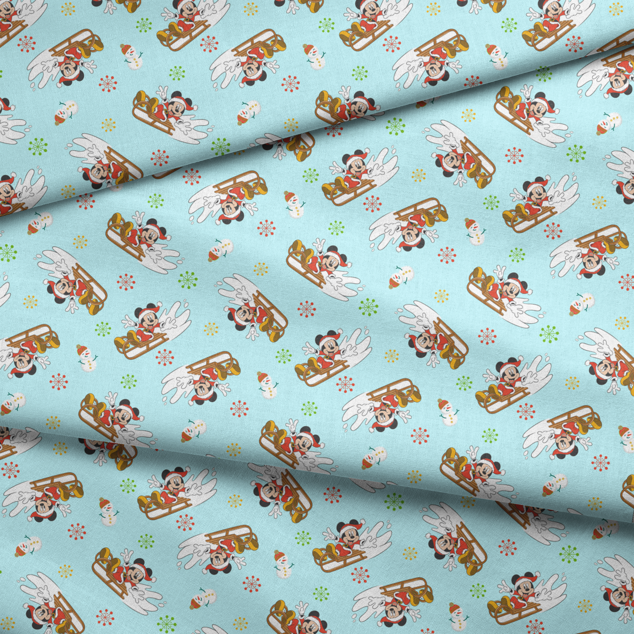 Christmas pattern with Mickey Mouse on sleds, snowmen, and colorful snowflakes on light blue background fabric fold mockup