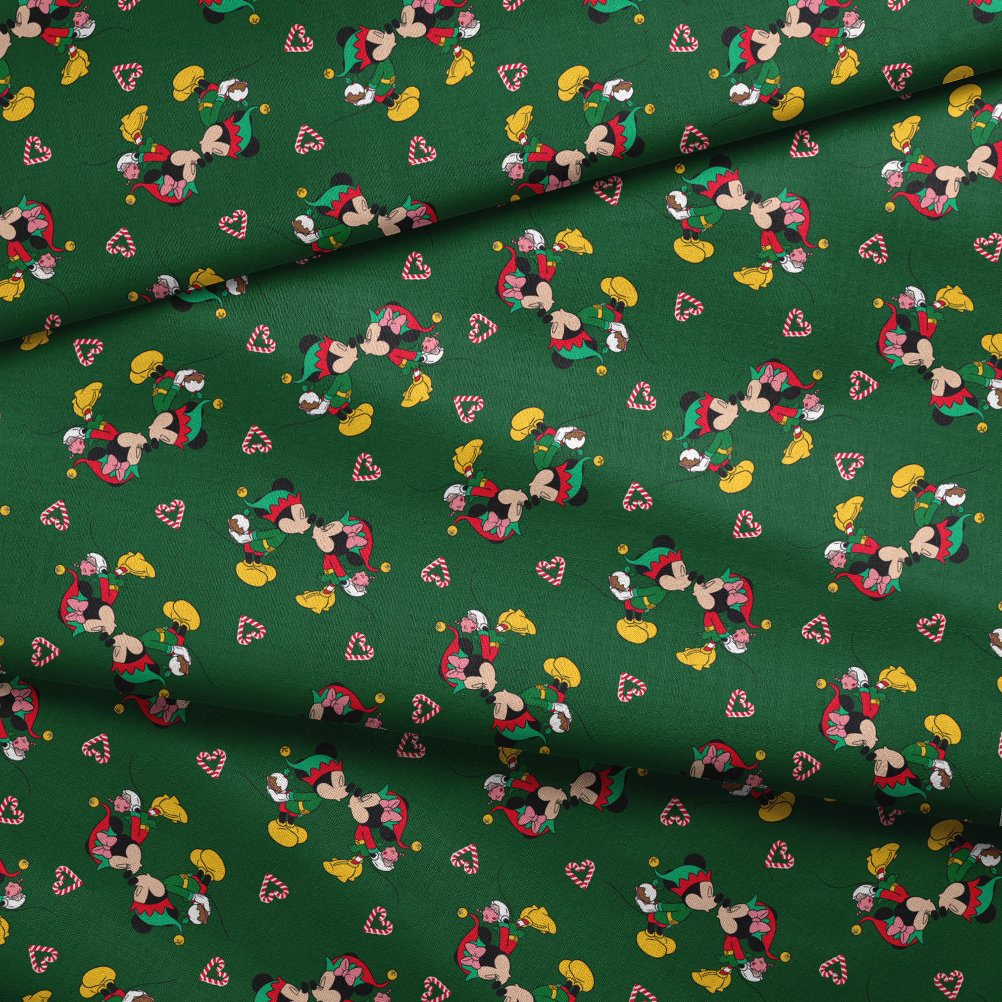 Festive Mickey Mouse pattern with candy canes on green background fabric fold mockup