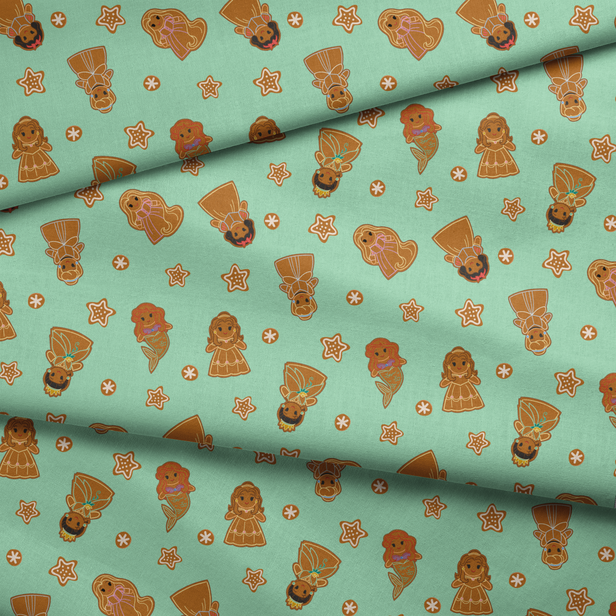 Disney Princess gingerbread cookies with star and snowflake designs on mint green background fabric fold mockup