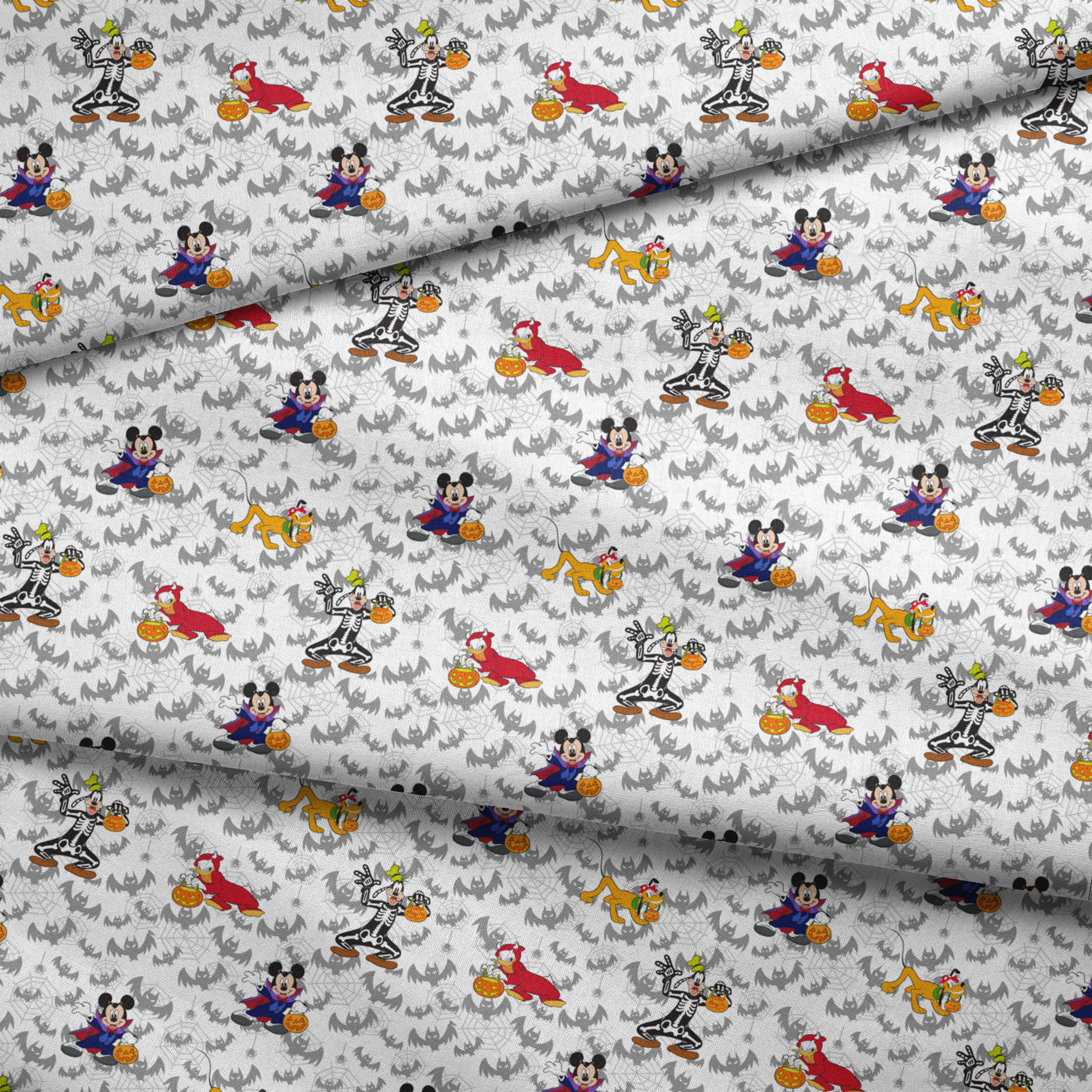 Disney cartoon characters in Halloween costumes with pumpkins on bat pattern background fabric fold mockup