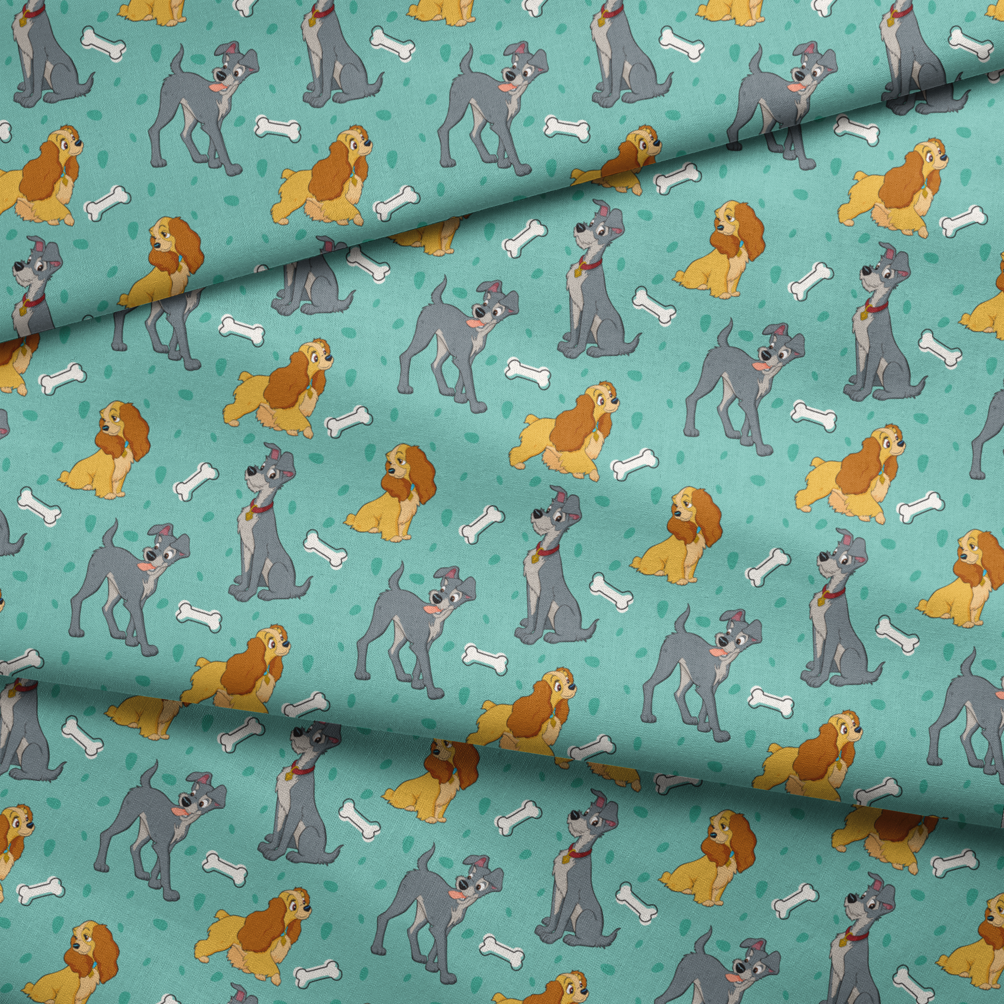 Cartoon pattern of gray dogs and golden cocker spaniels with white bones on turquoise background fabric fold mockup