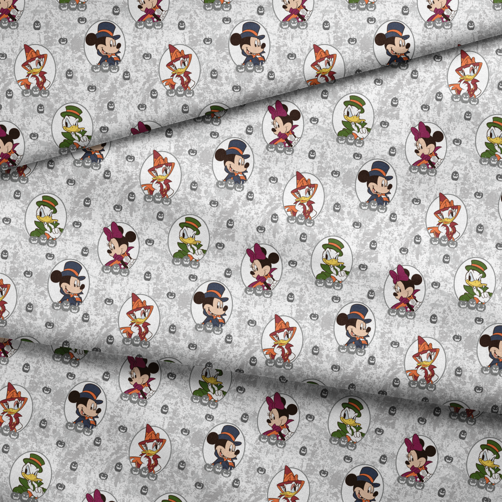 Disney Halloween pattern with Mickey in top hat, Donald in green hat, and Daisy in witch hat on gray background with pumpkins. fabric fold mockup