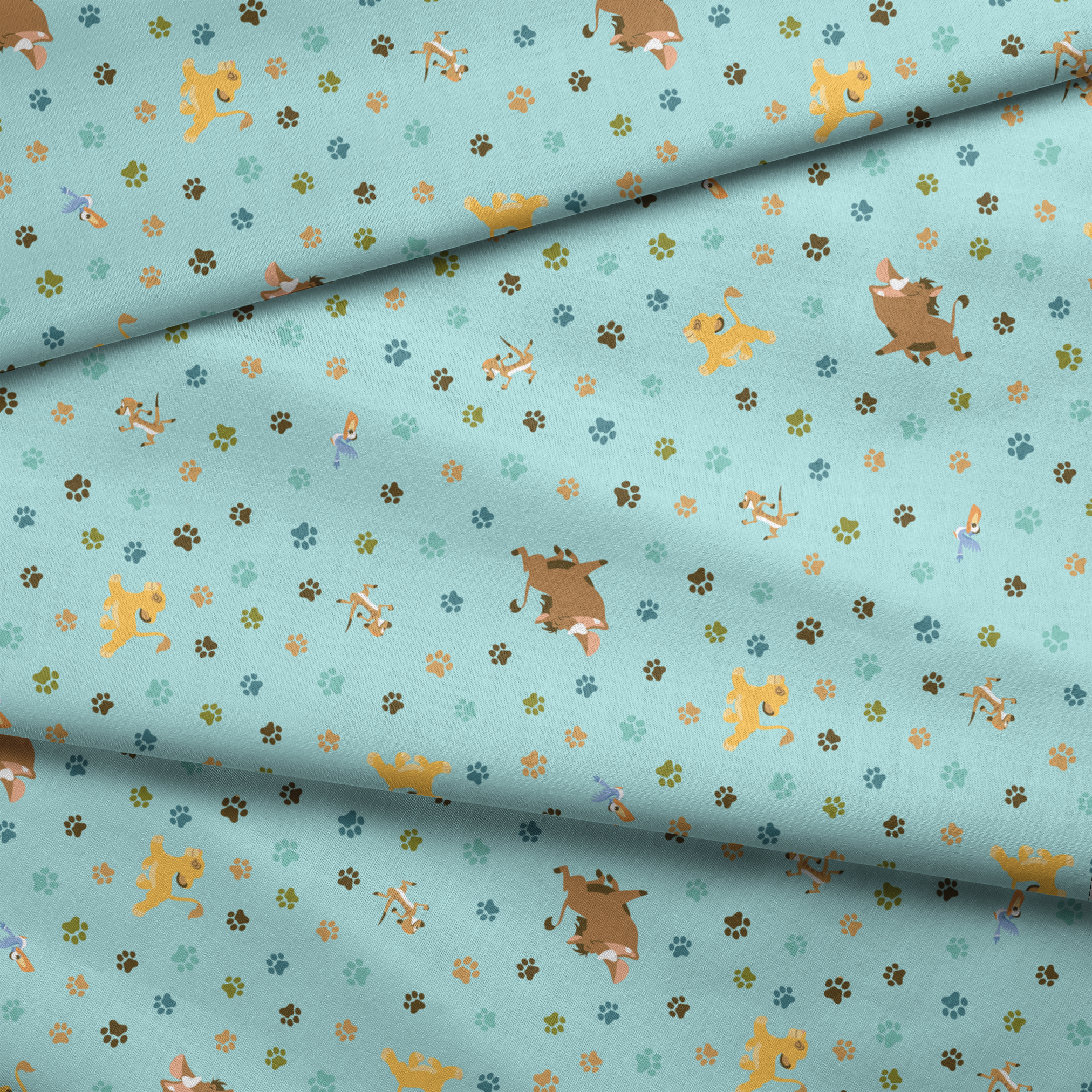The Lion King pattern with paw prints on light blue background fabric fold mockup