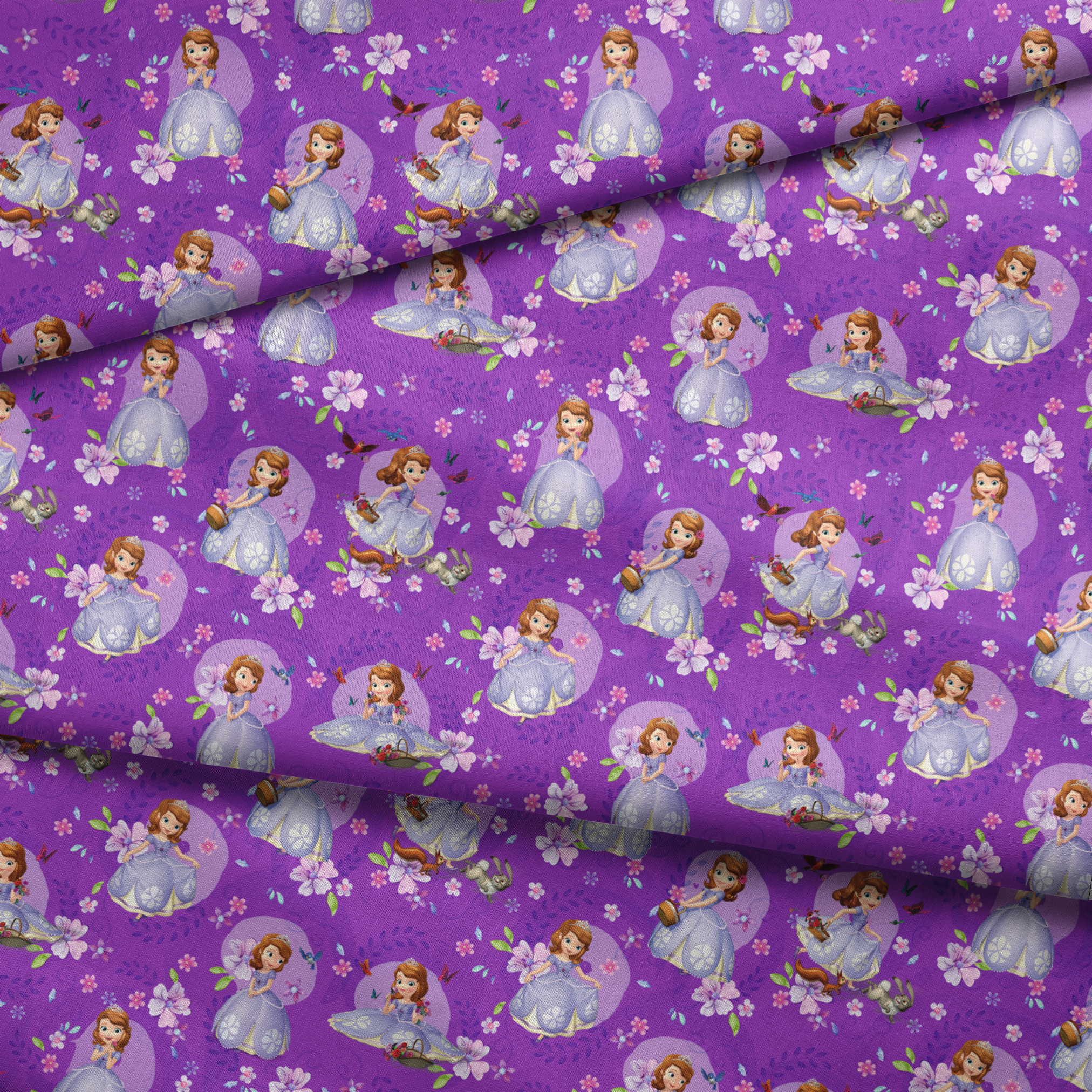 Purple background with repeating pattern of Sofia character in lavender dress surrounded by pink flowers and circular accents fabric fold mockup