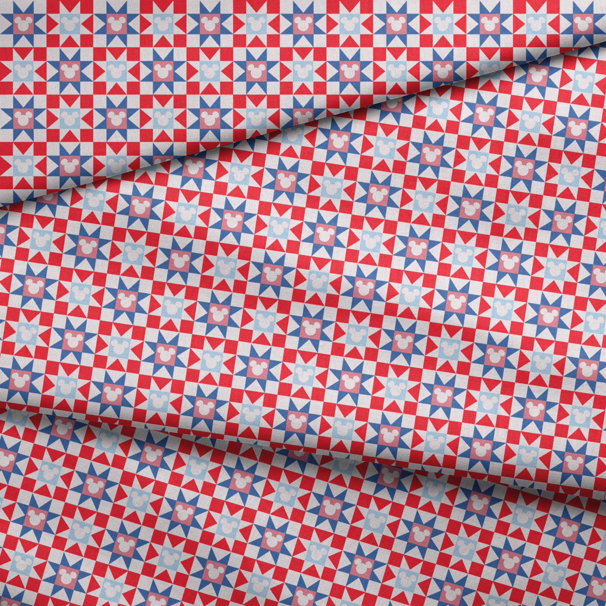 Un patrón de colcha con estrellas en rojo, blanco y azul, con siluetas de Mickey Mouse en el centro de cada estrella. fabric fold mockup