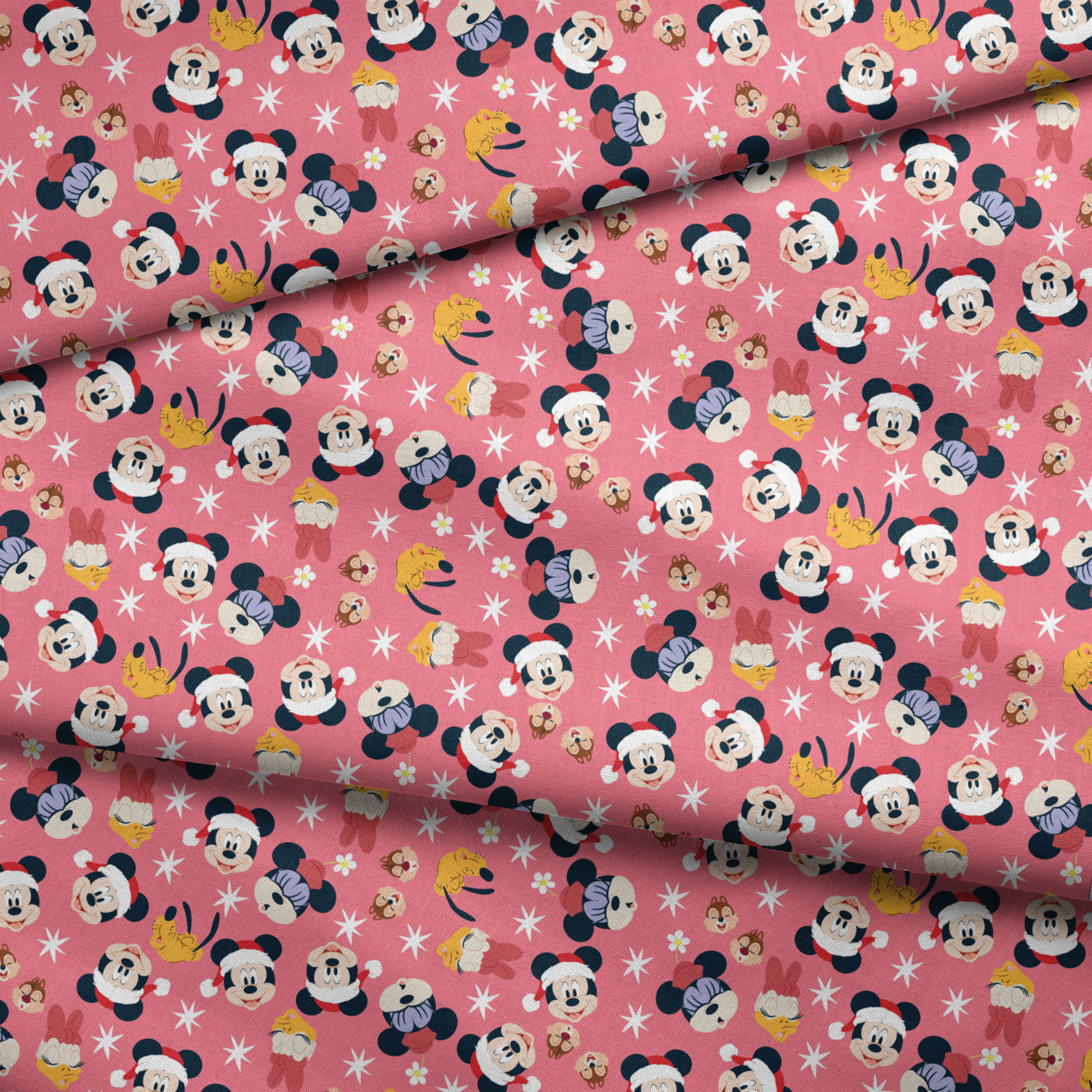 Mickey Mouse pattern with holiday elements on pink background, featuring white stars and gold accents fabric fold mockup