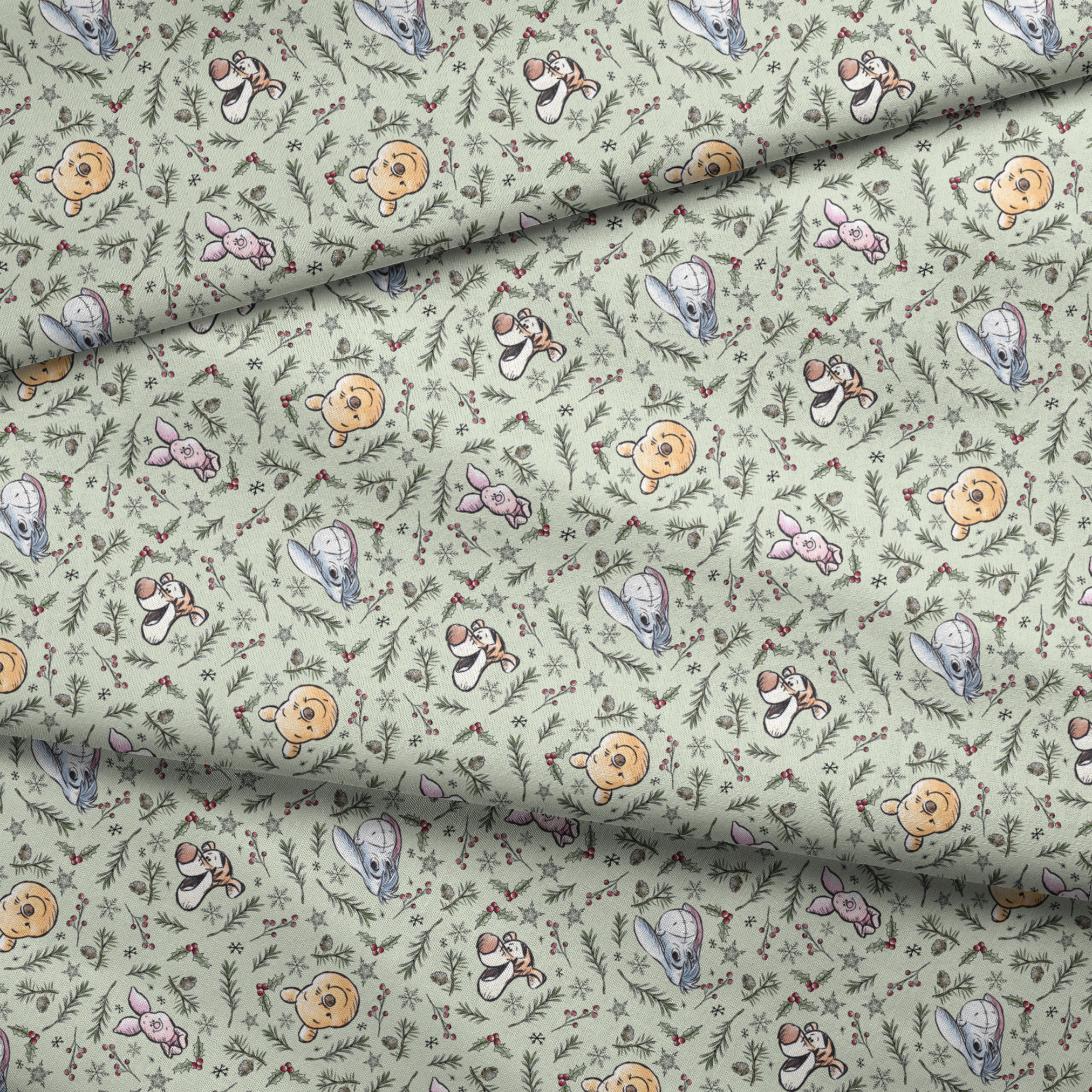 Whimsical holiday pattern with cartoon animals, pine branches, berries, and snowflakes on mint green fabric fold mockup