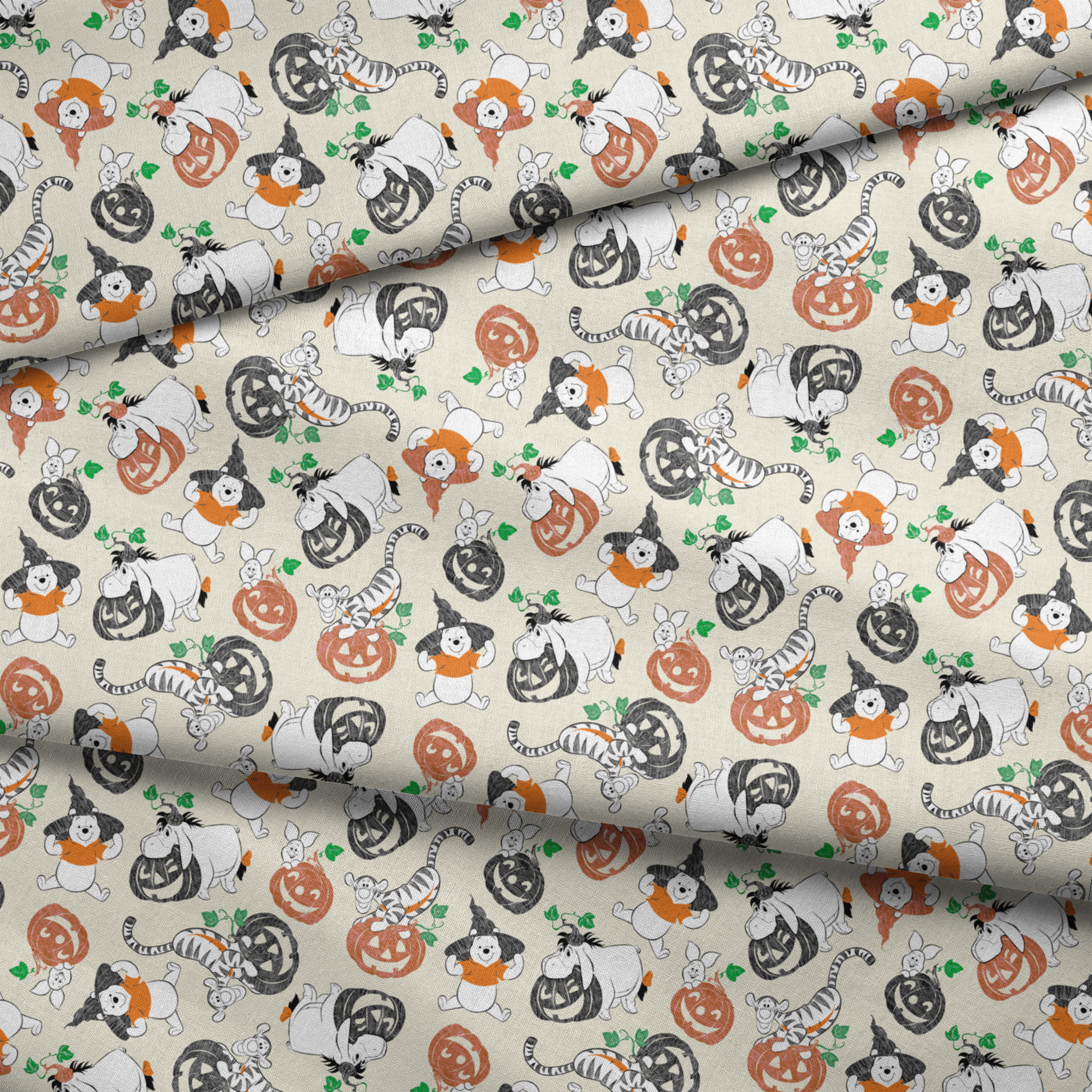 Whimsical Halloween pattern with cartoon ghosts, pumpkins, cats, and bears on cream background fabric fold mockup