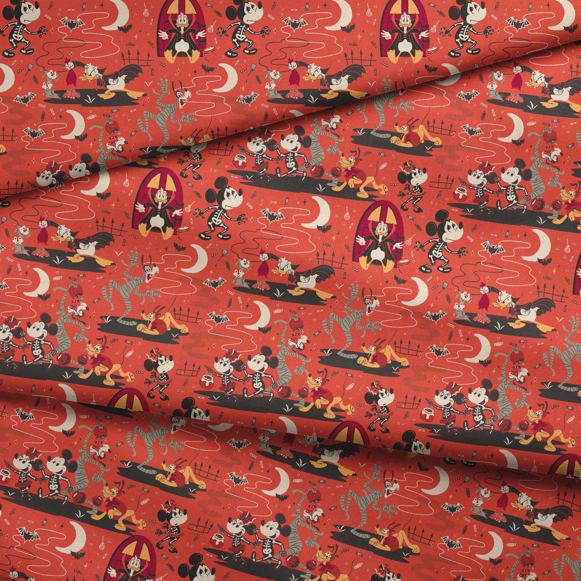 Halloween-themed Disney pattern with Mickey, Minnie, Donald in skeleton costumes on orange background with bats and moons fabric fold mockup