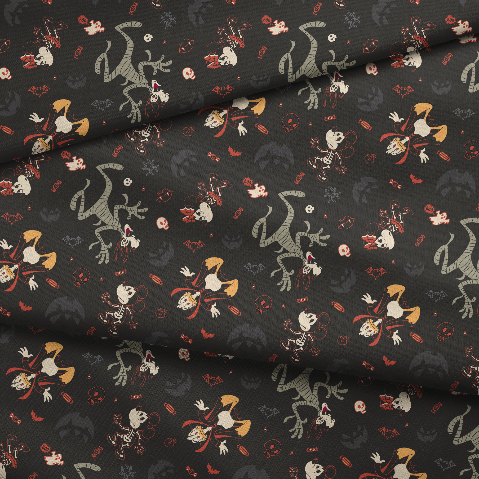 Disney Halloween pattern with Mickey & friends and candy on dark background fabric fold mockup