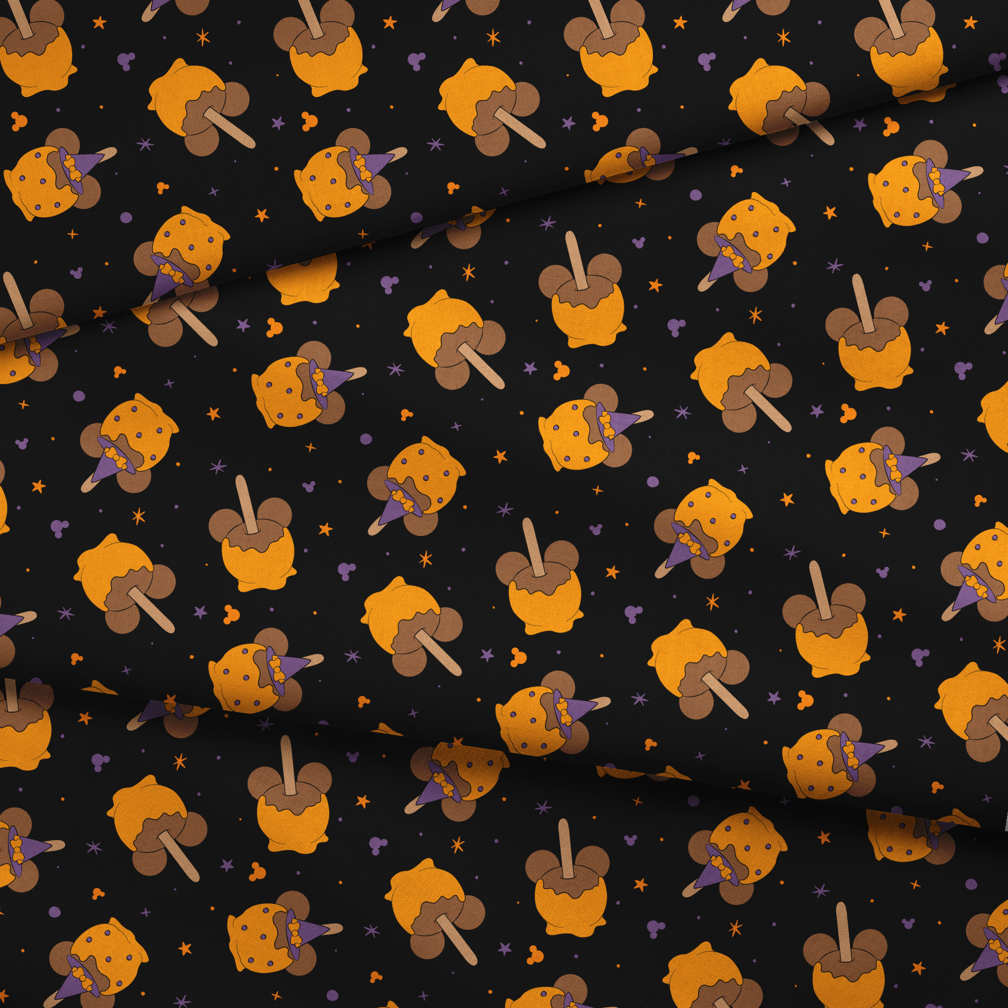 Disney-inspired caramel apples and candy apples floating in a space-like black background with purple stars. fabric fold mockup