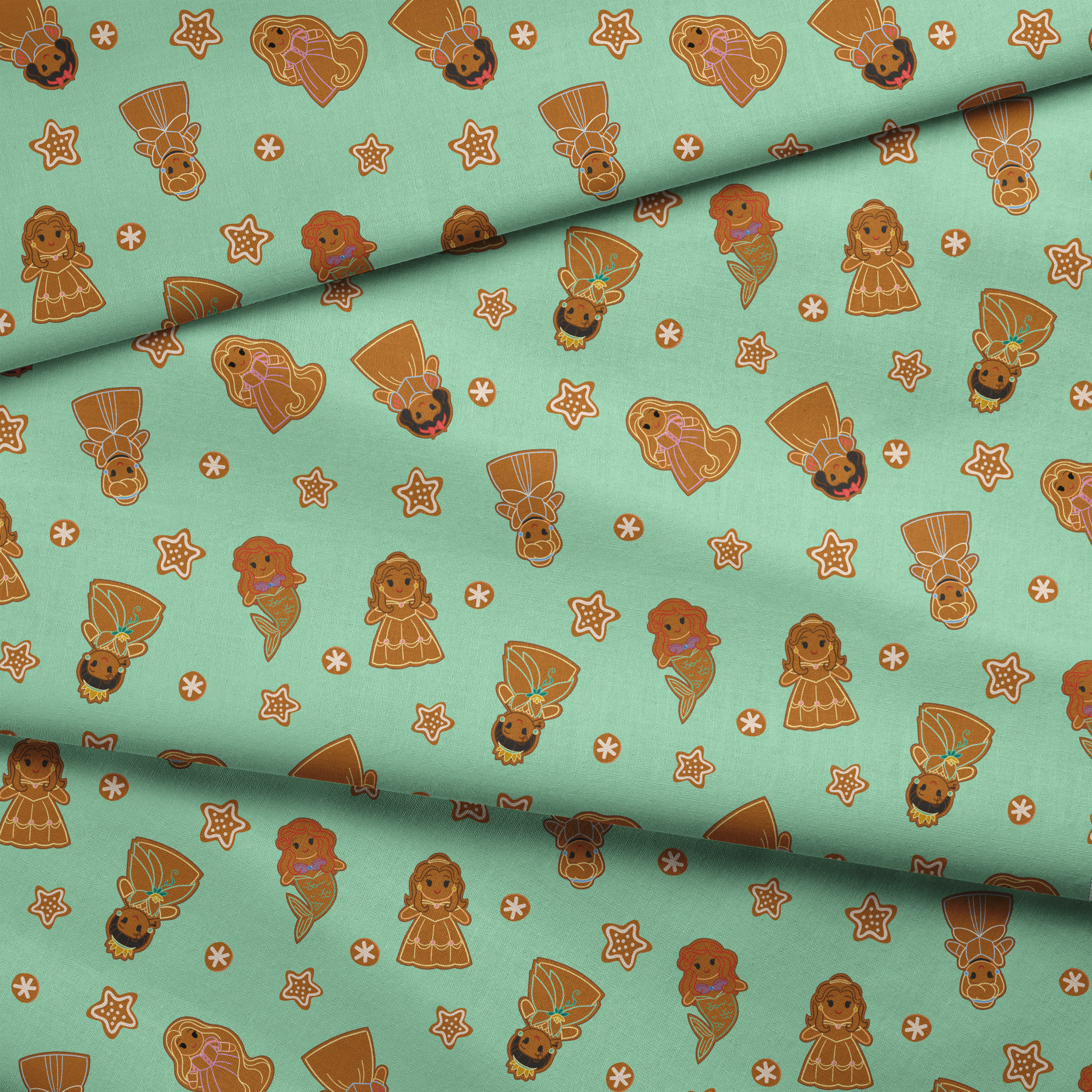 Disney Princess gingerbread cookies with star and snowflake designs on mint green background fabric fold mockup