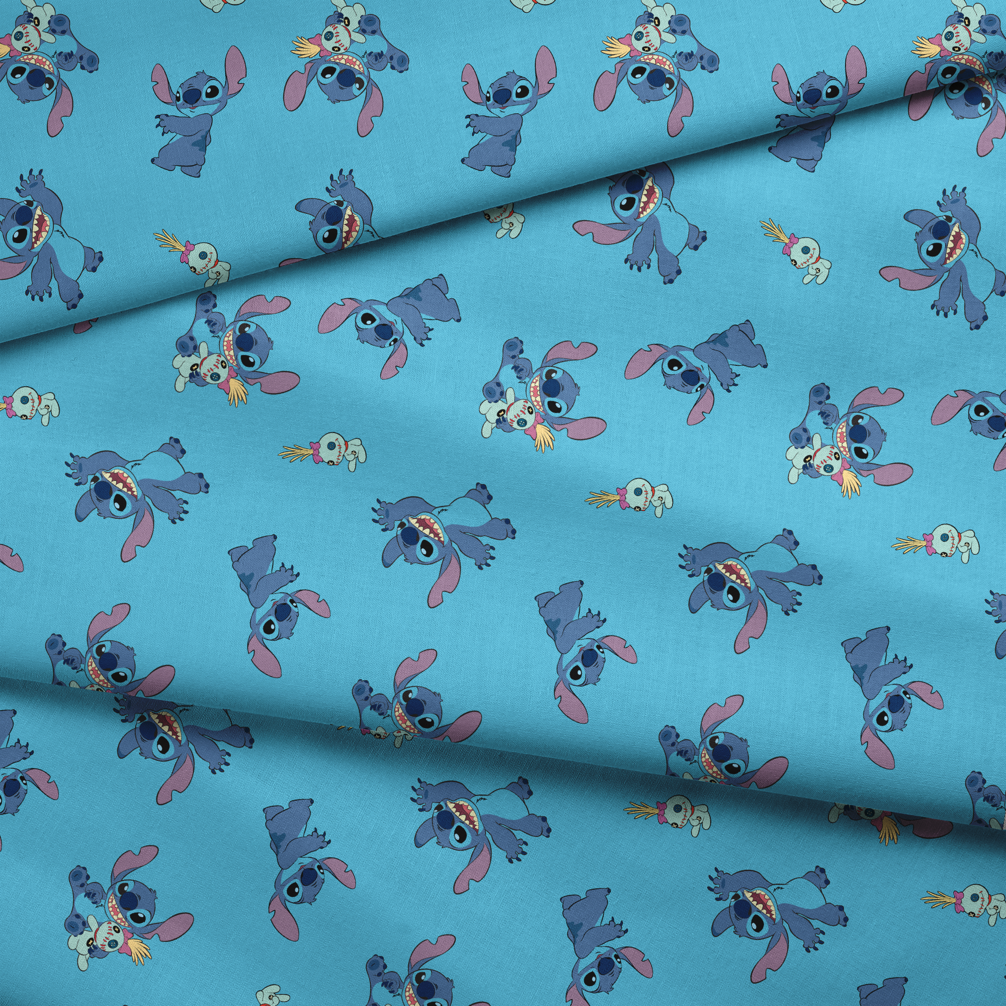 Disney’s Stitch and Scrump in various playful poses scattered across a light blue background with small tropical flowers. fabric fold mockup