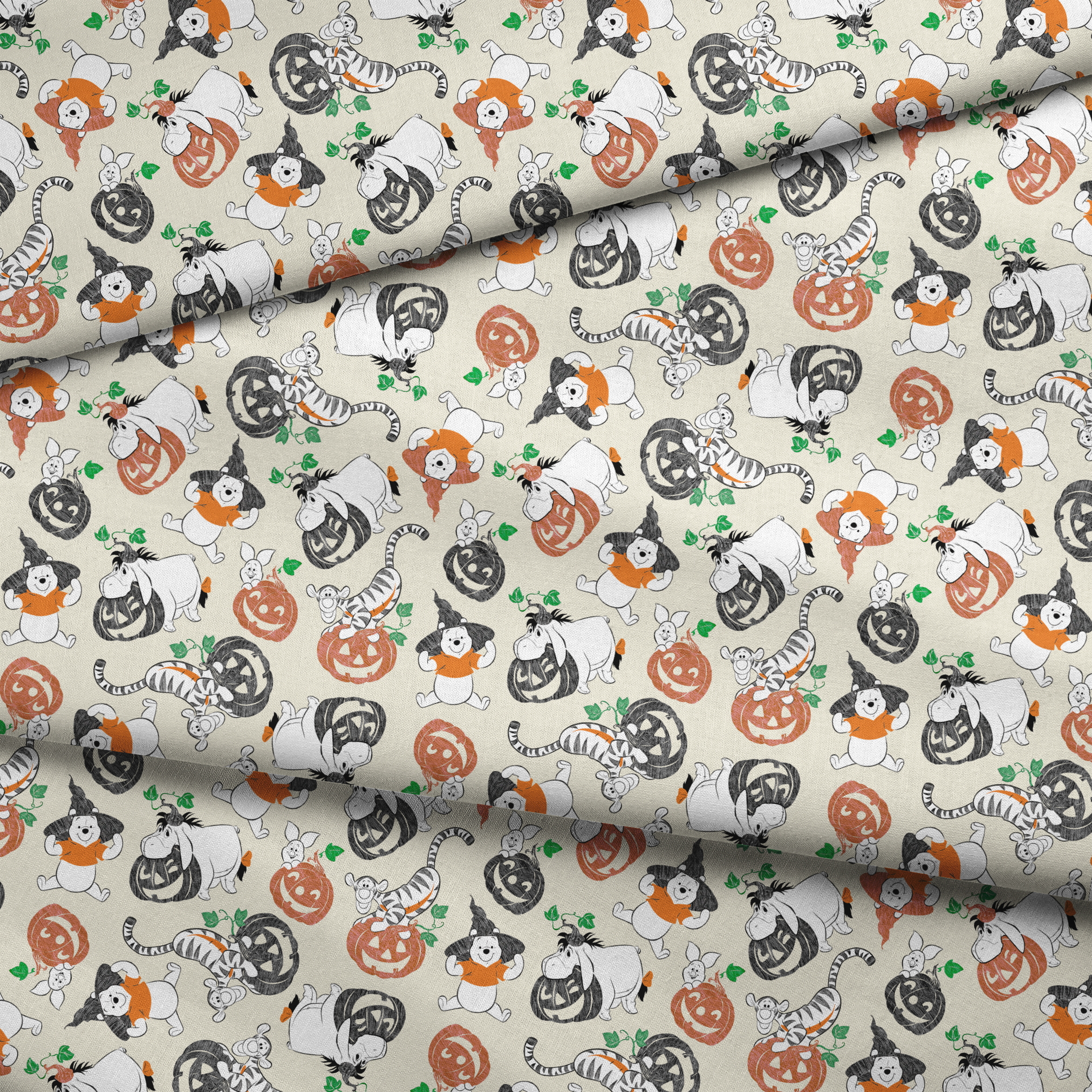 Whimsical Halloween pattern with cartoon ghosts, pumpkins, cats, and bears on cream background fabric fold mockup