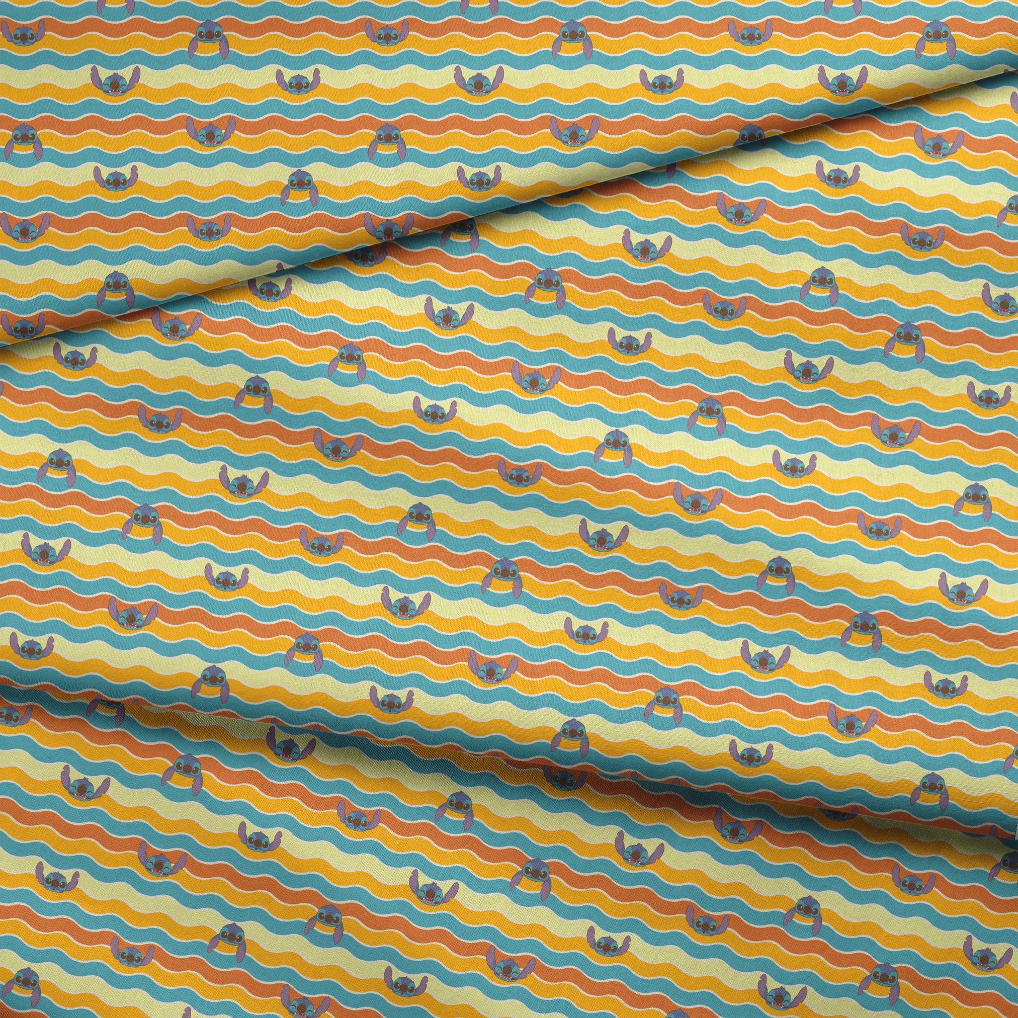 Colorful wavy striped pattern with Stitch peeking between orange, yellow, and teal waves fabric fold mockup