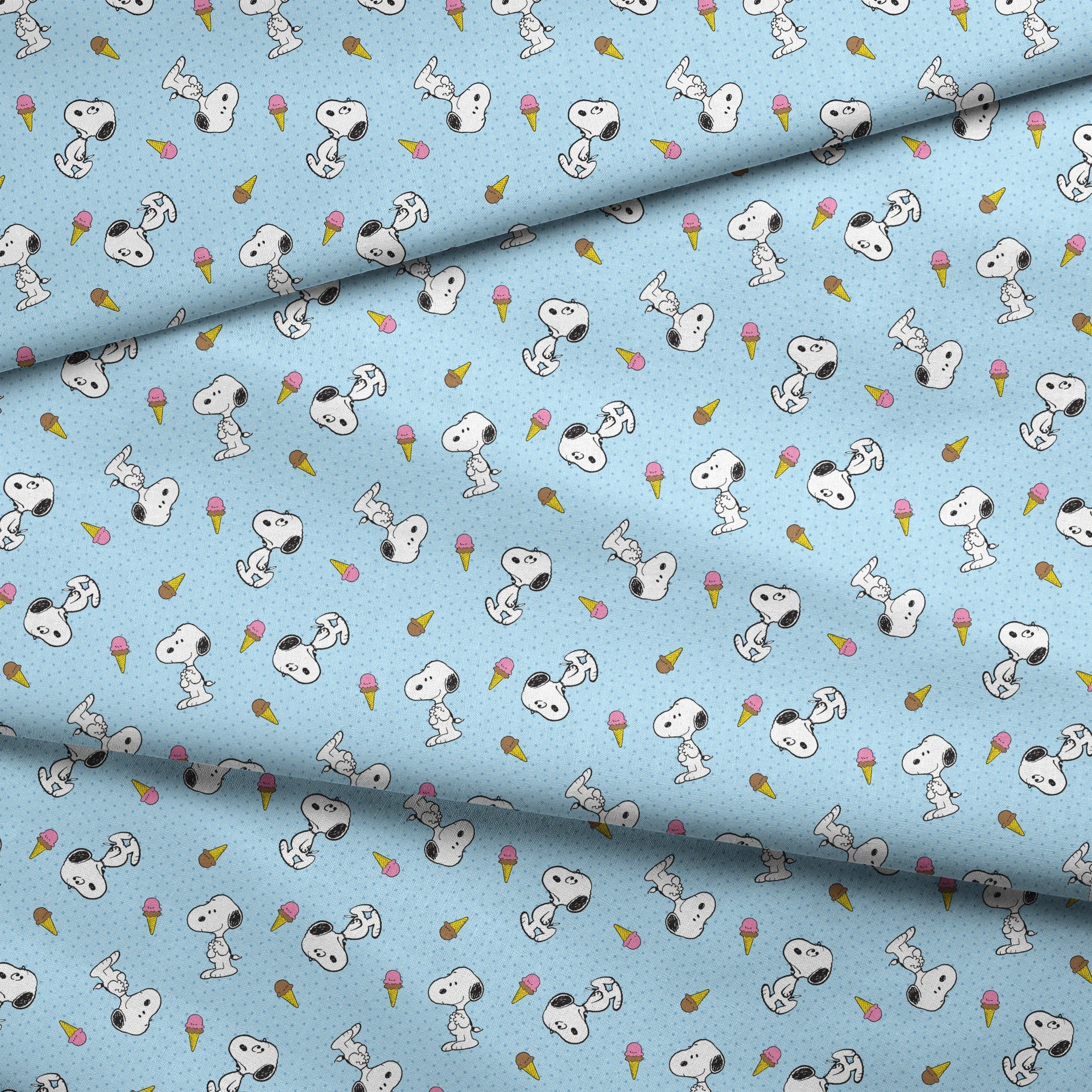 Snoopy pattern on light blue background with ice cream cones and small white dots fabric fold mockup